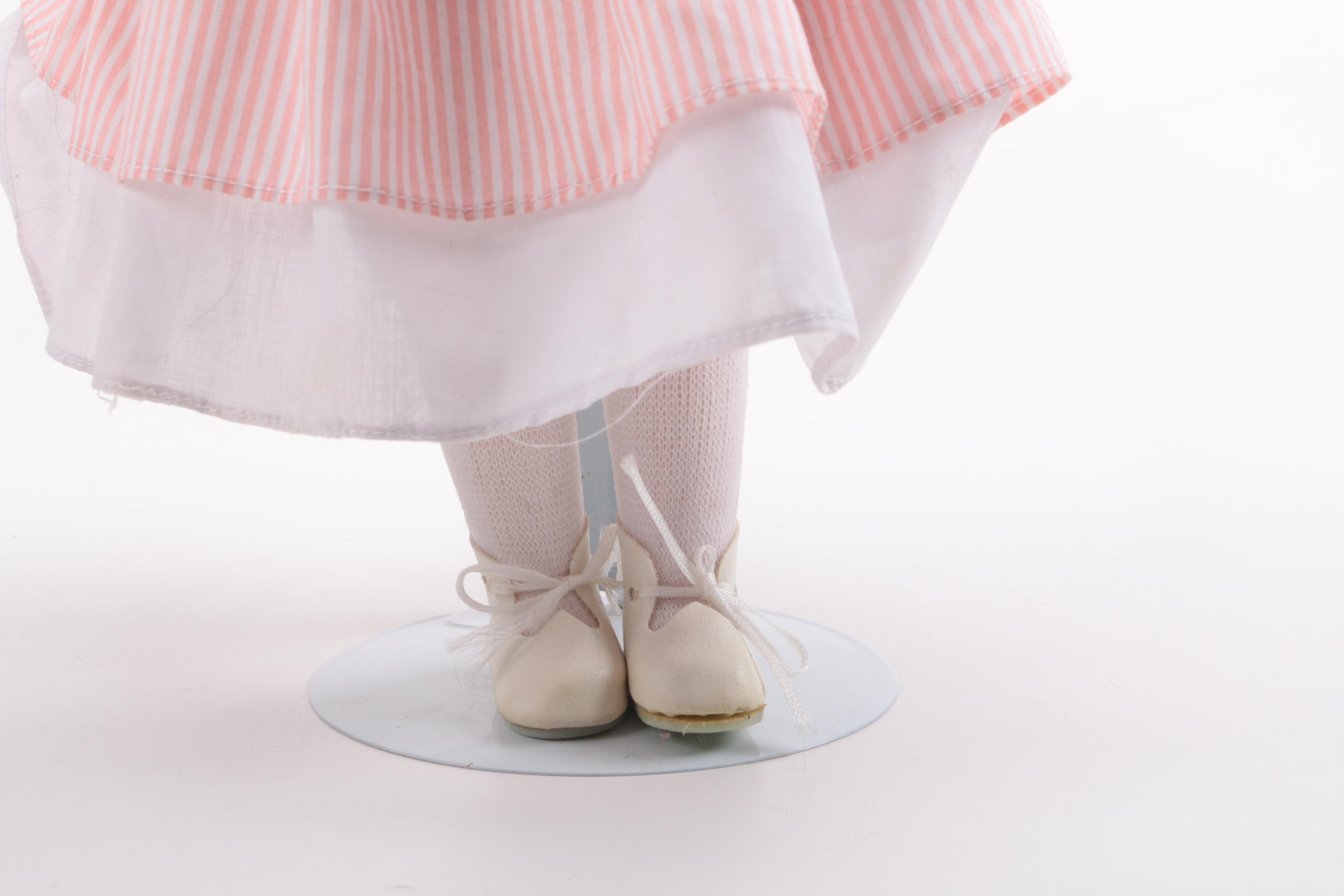 Blue and Pink Dressed Porcelain Dolls