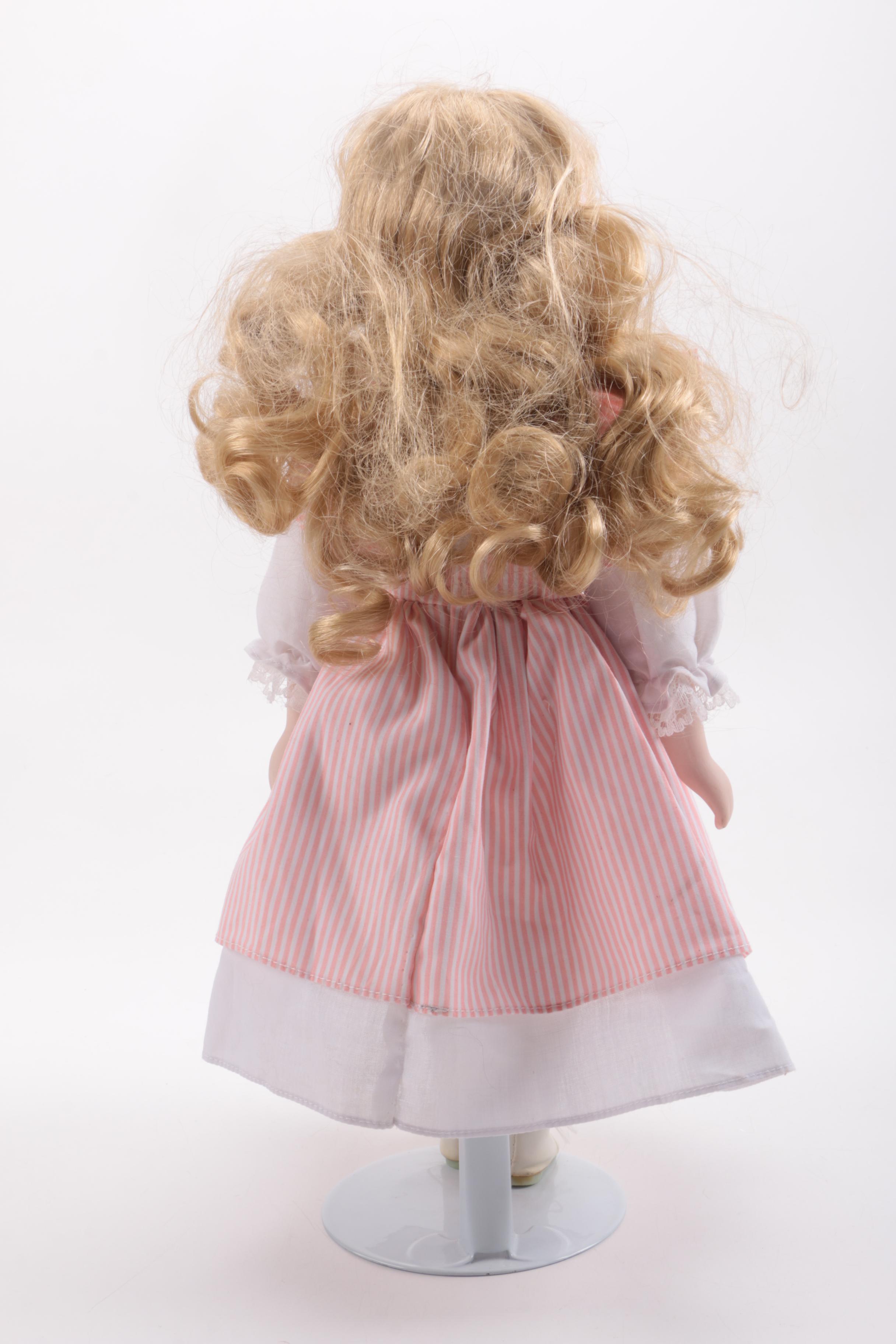 Blue and Pink Dressed Porcelain Dolls