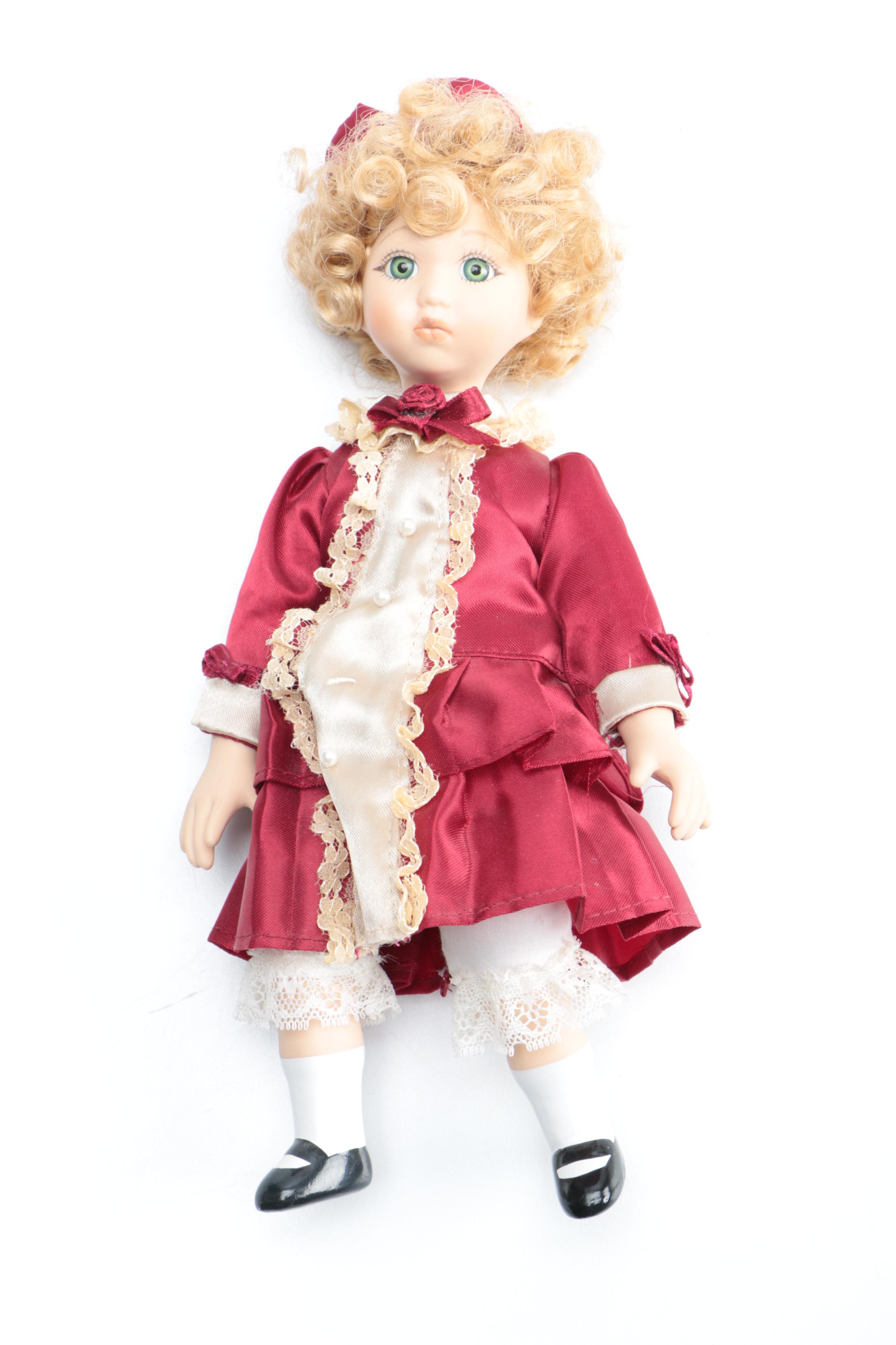 Set of Three Porcelain Dolls