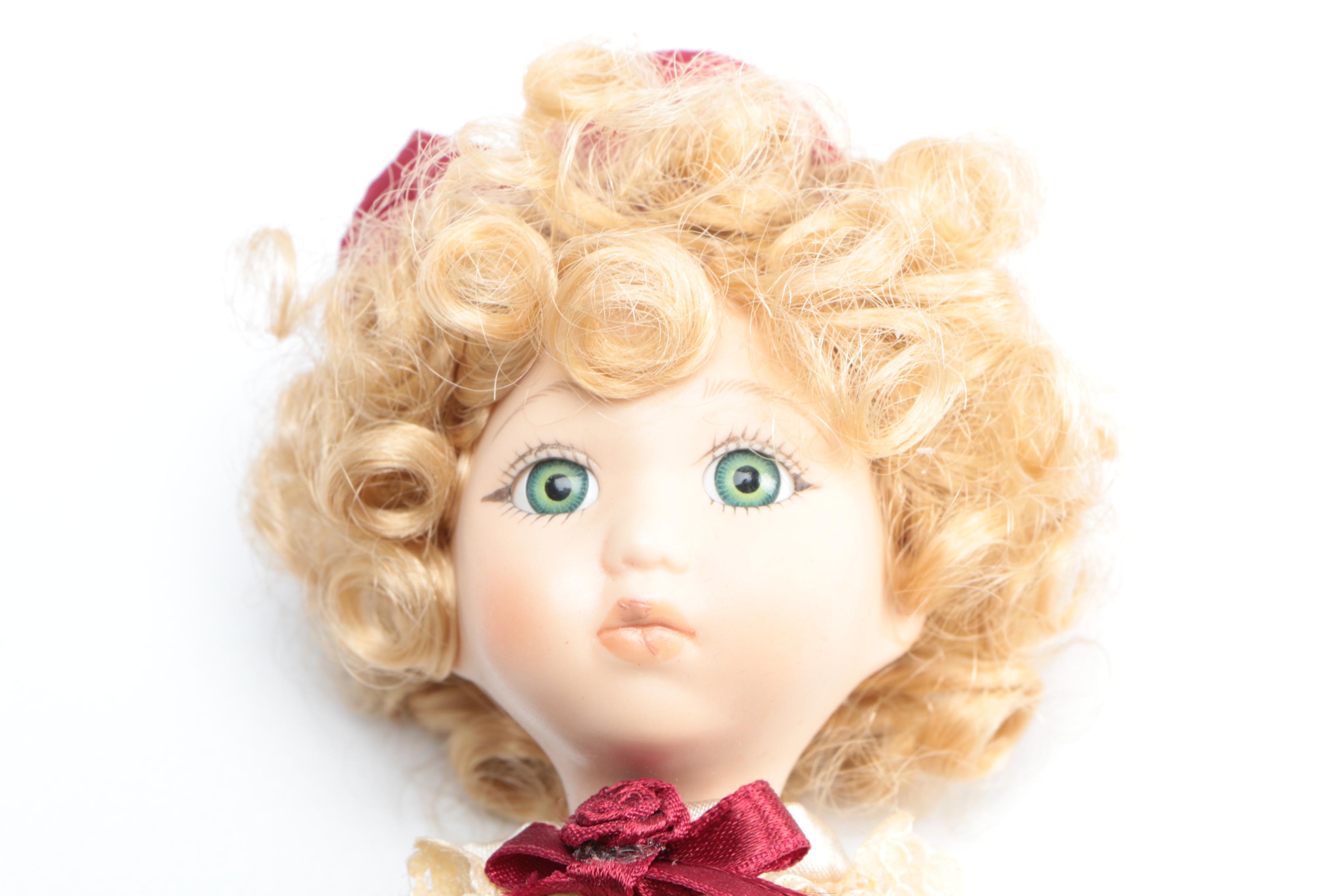 Set of Three Porcelain Dolls