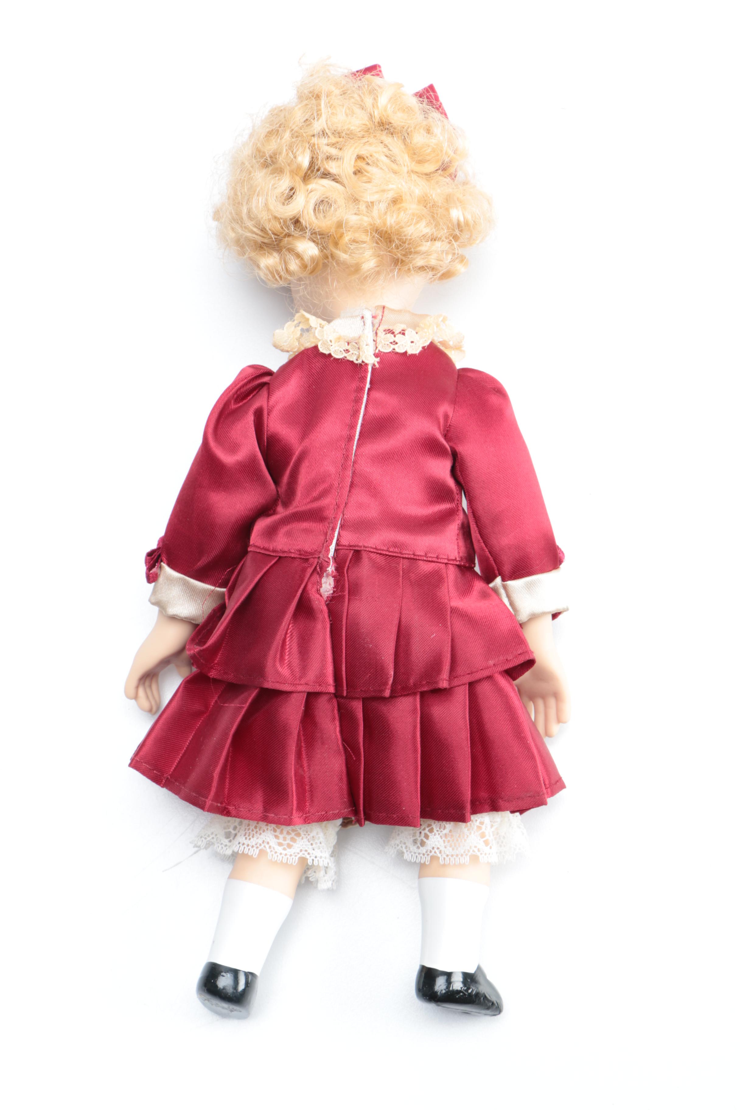 Set of Three Porcelain Dolls