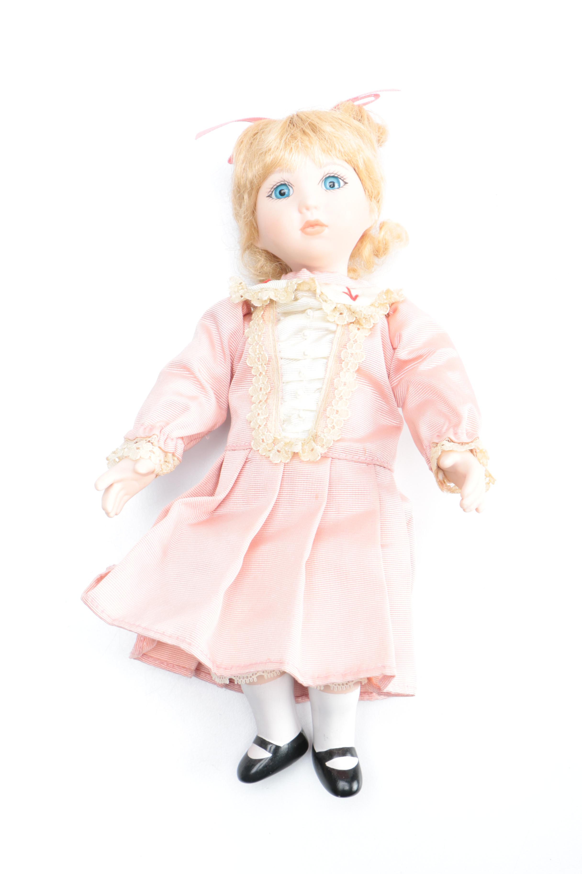 Set of Three Porcelain Dolls