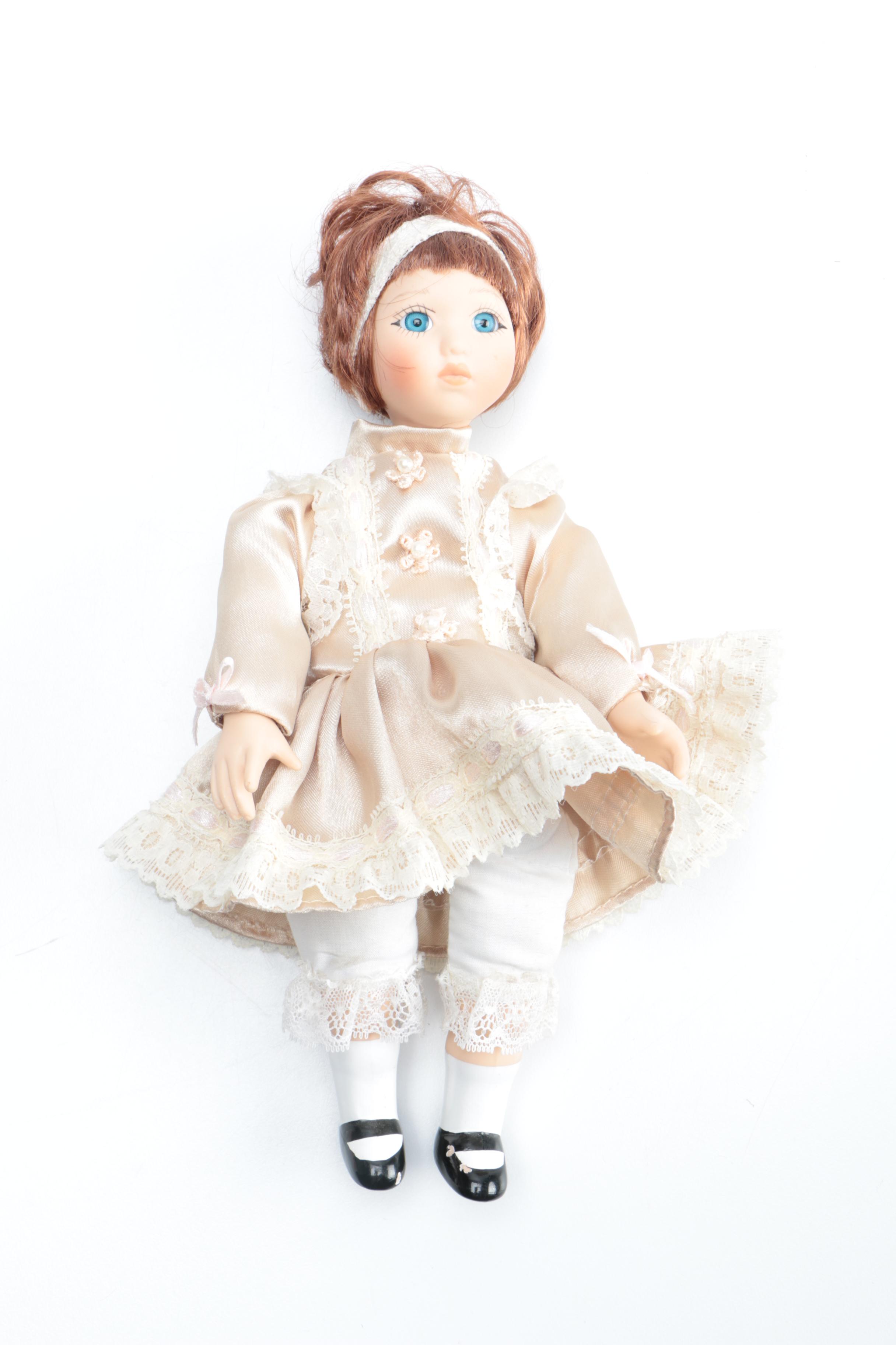 Set of Three Porcelain Dolls