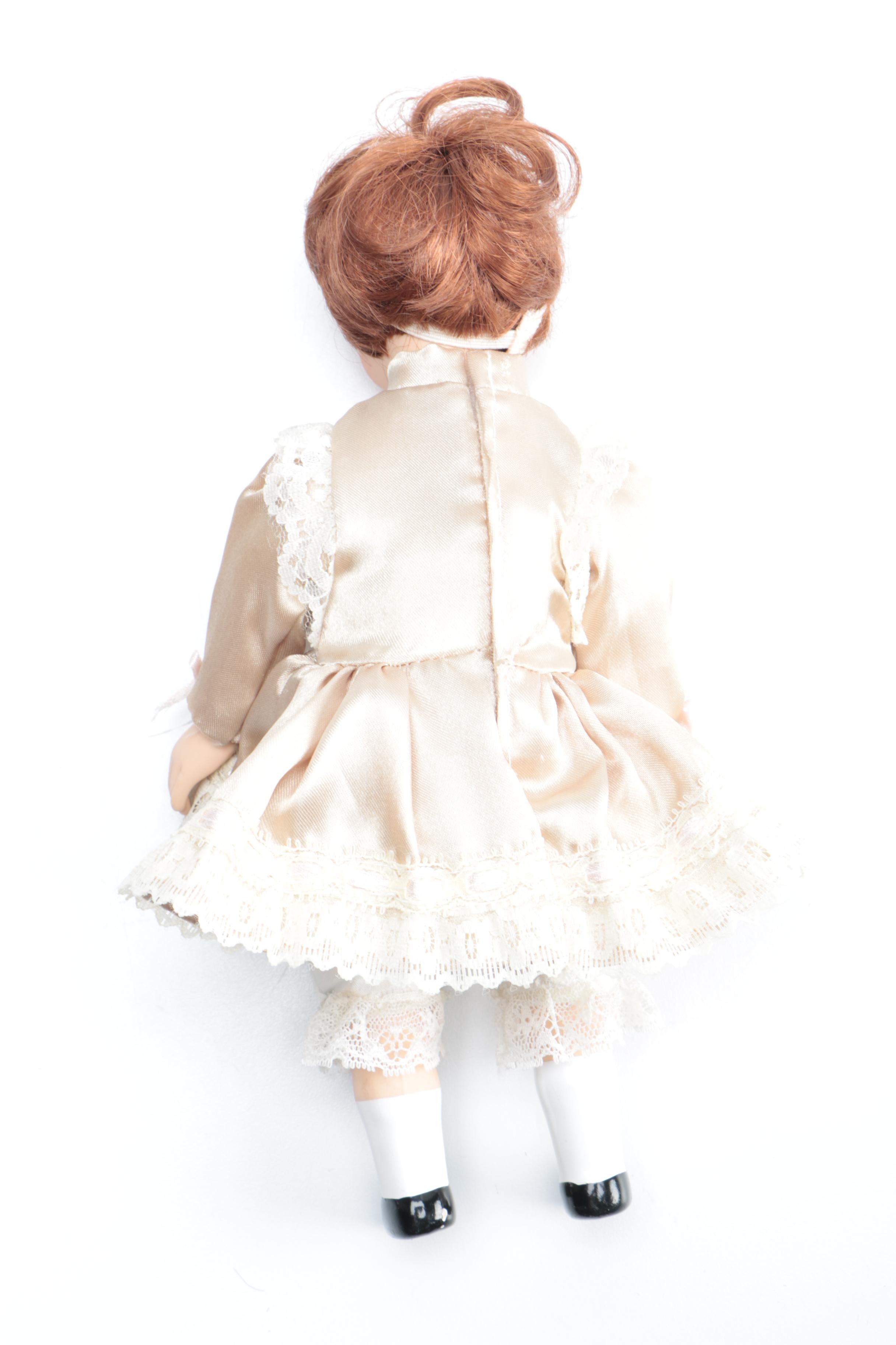 Set of Three Porcelain Dolls