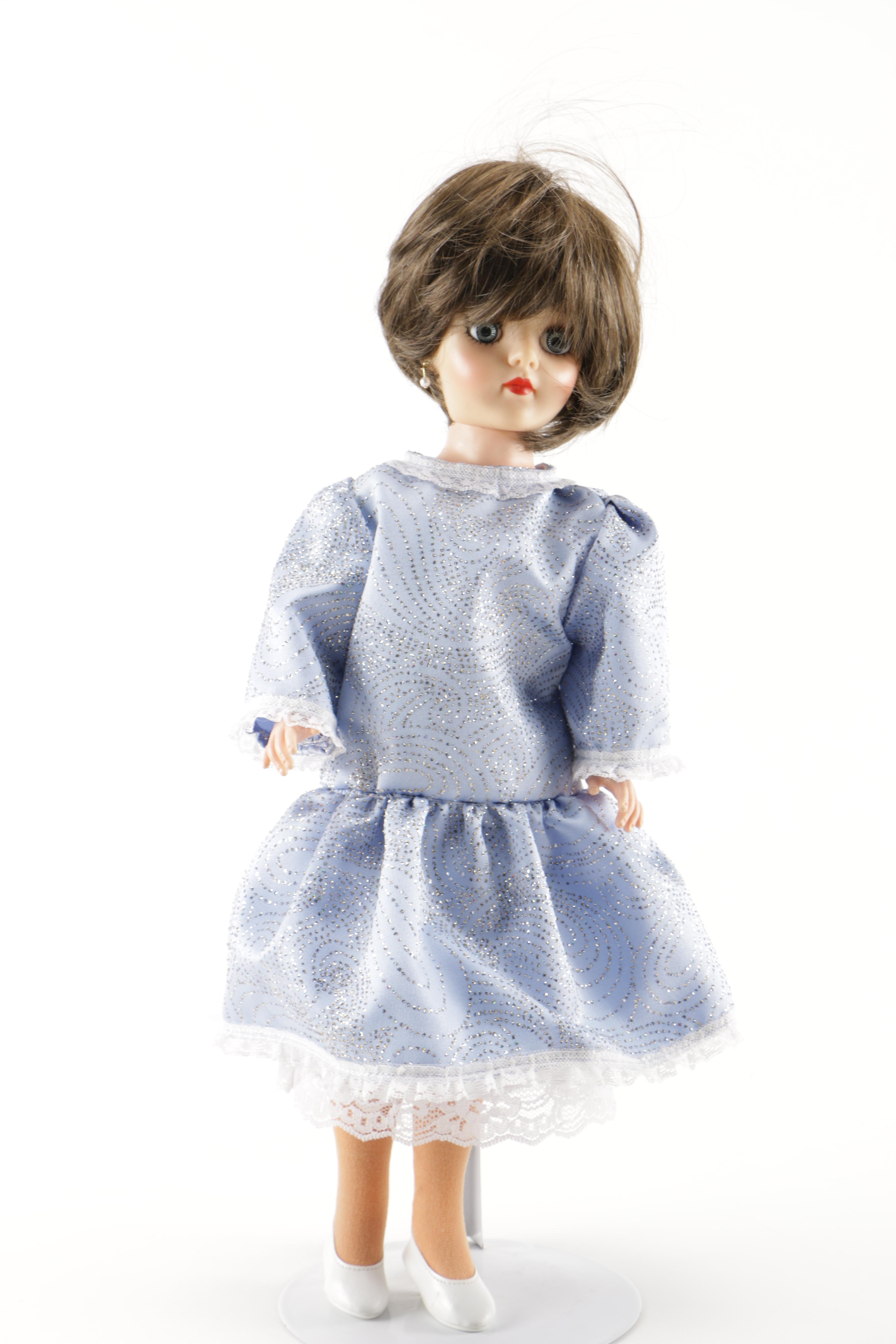 Porcelain Dolls and Plastic Doll