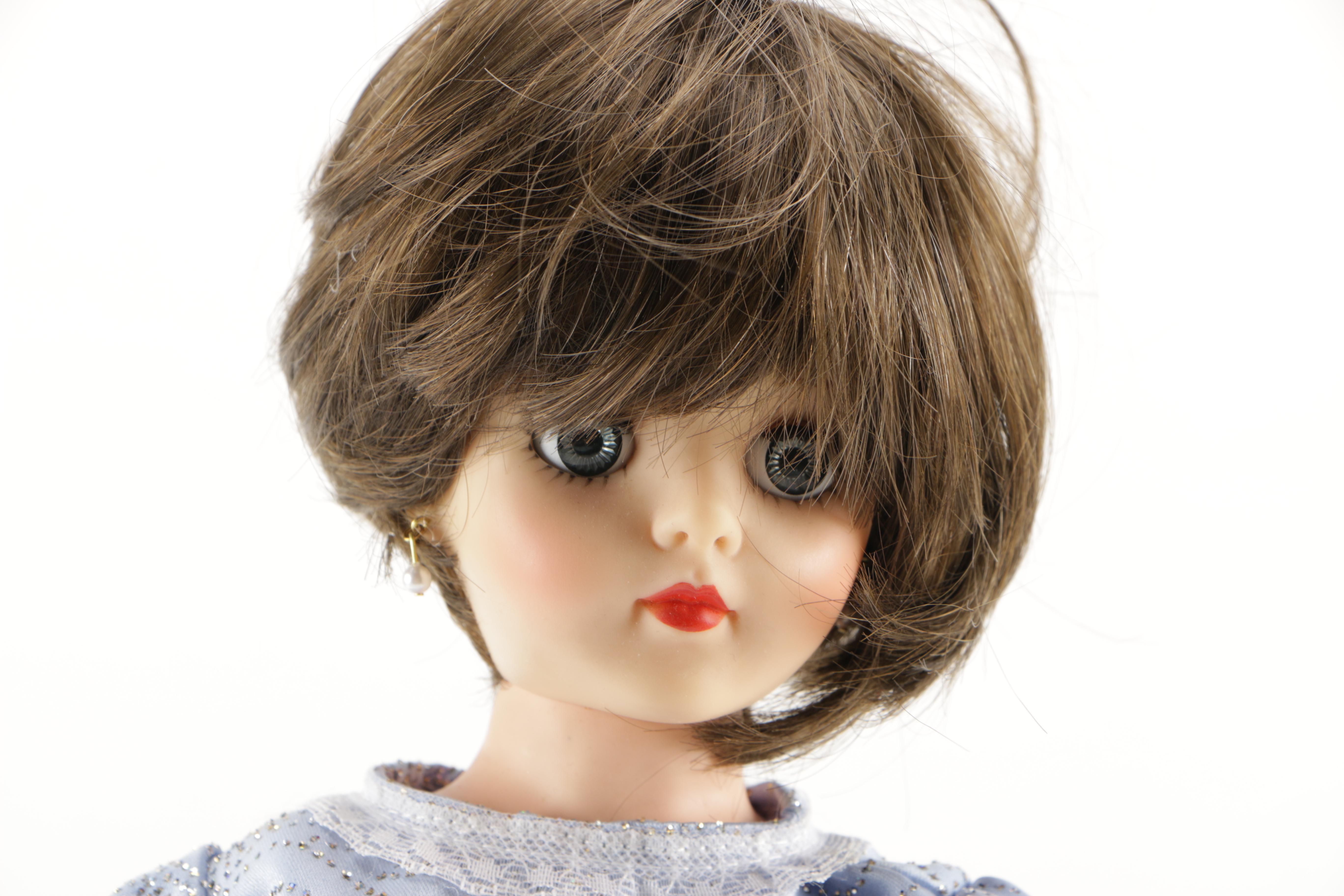 Porcelain Dolls and Plastic Doll