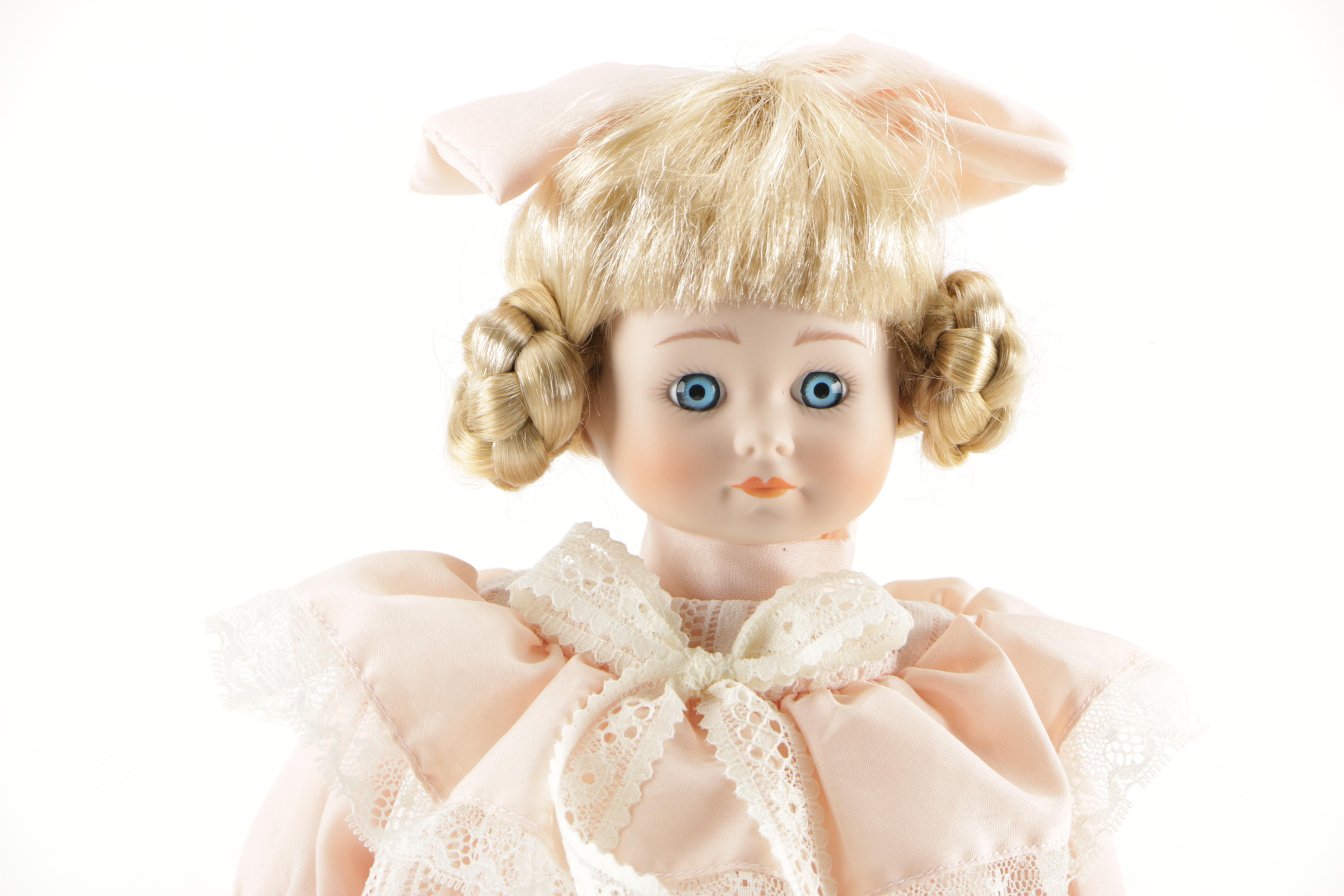 Porcelain Dolls and Plastic Doll