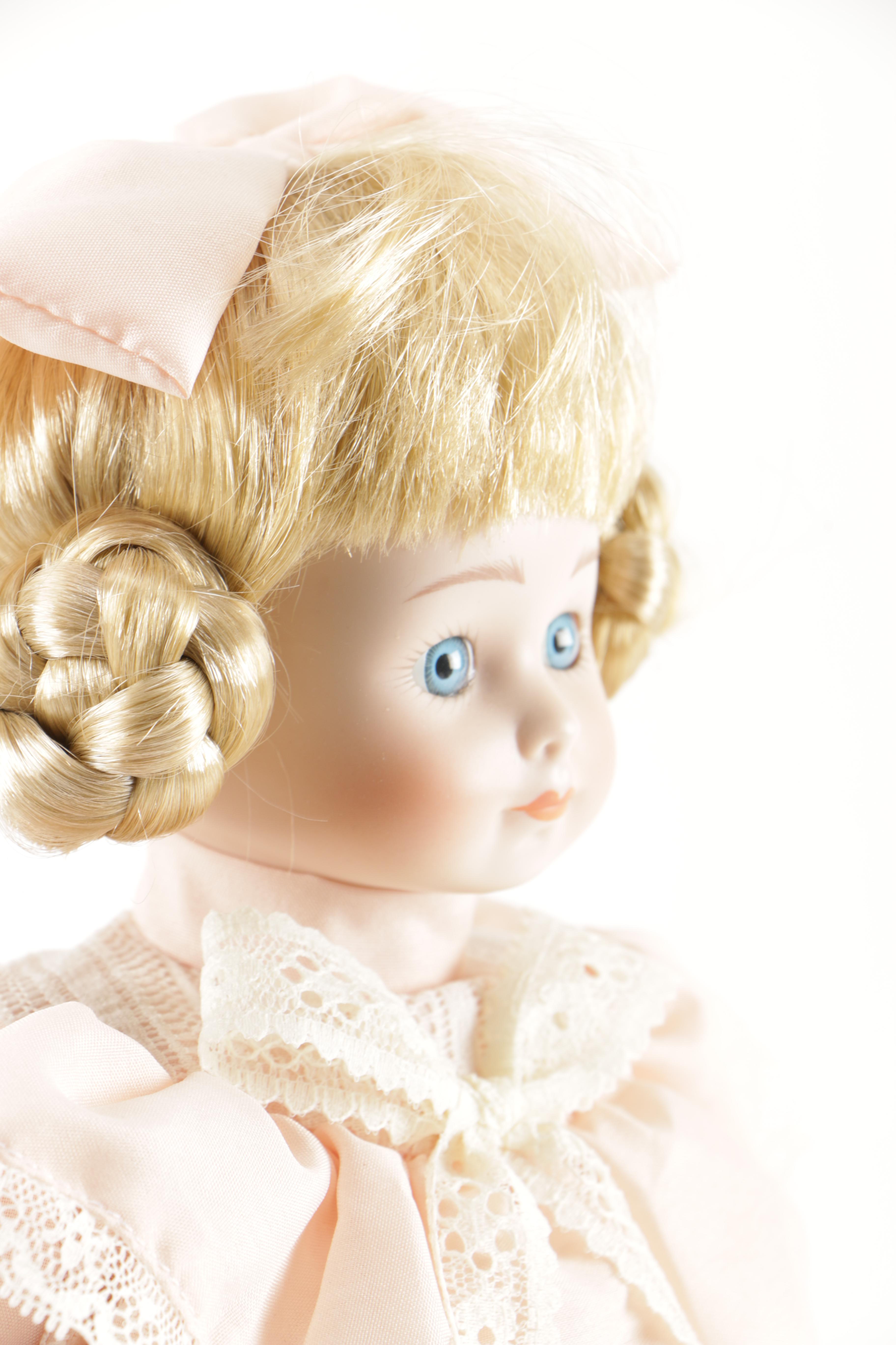 Porcelain Dolls and Plastic Doll
