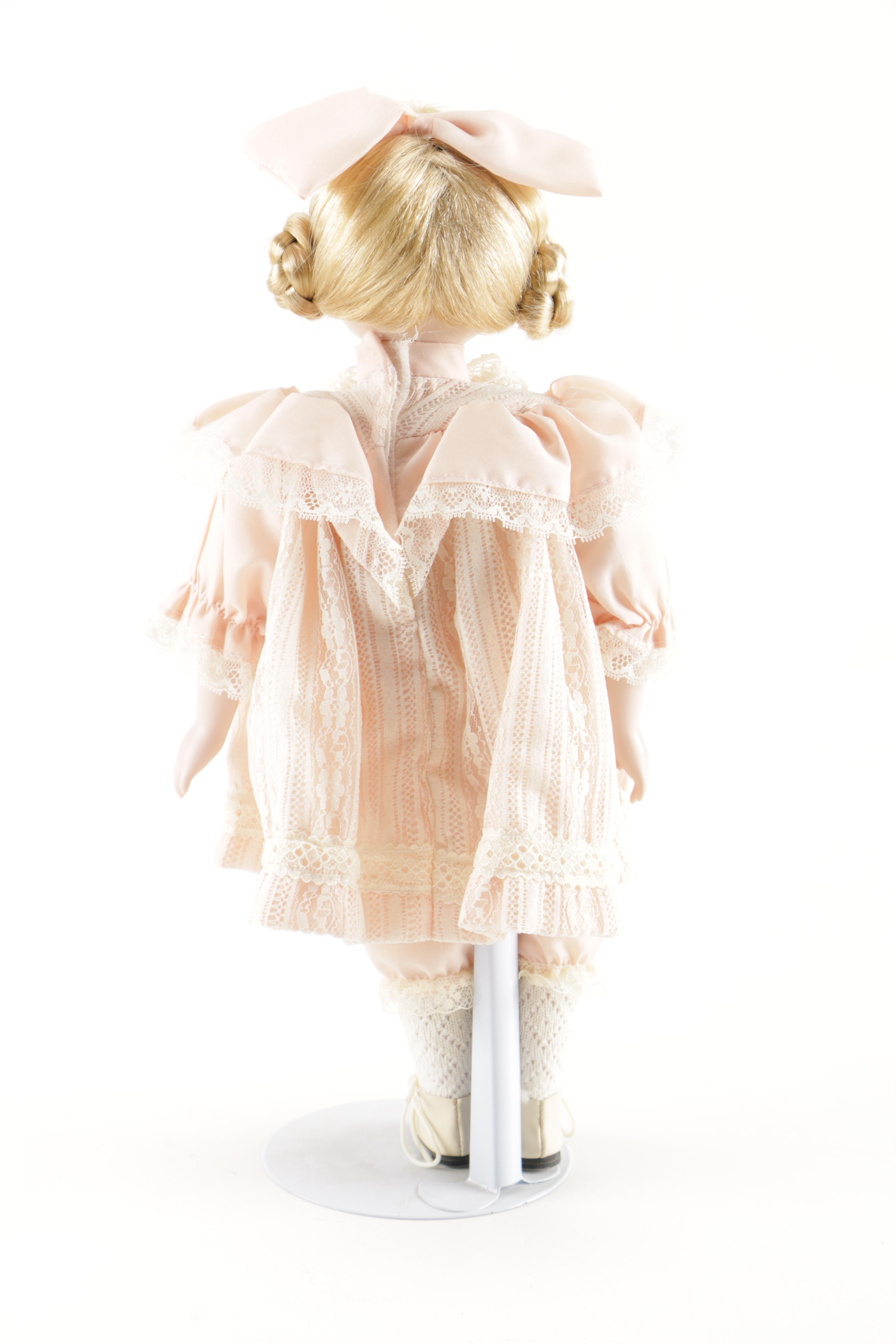 Porcelain Dolls and Plastic Doll