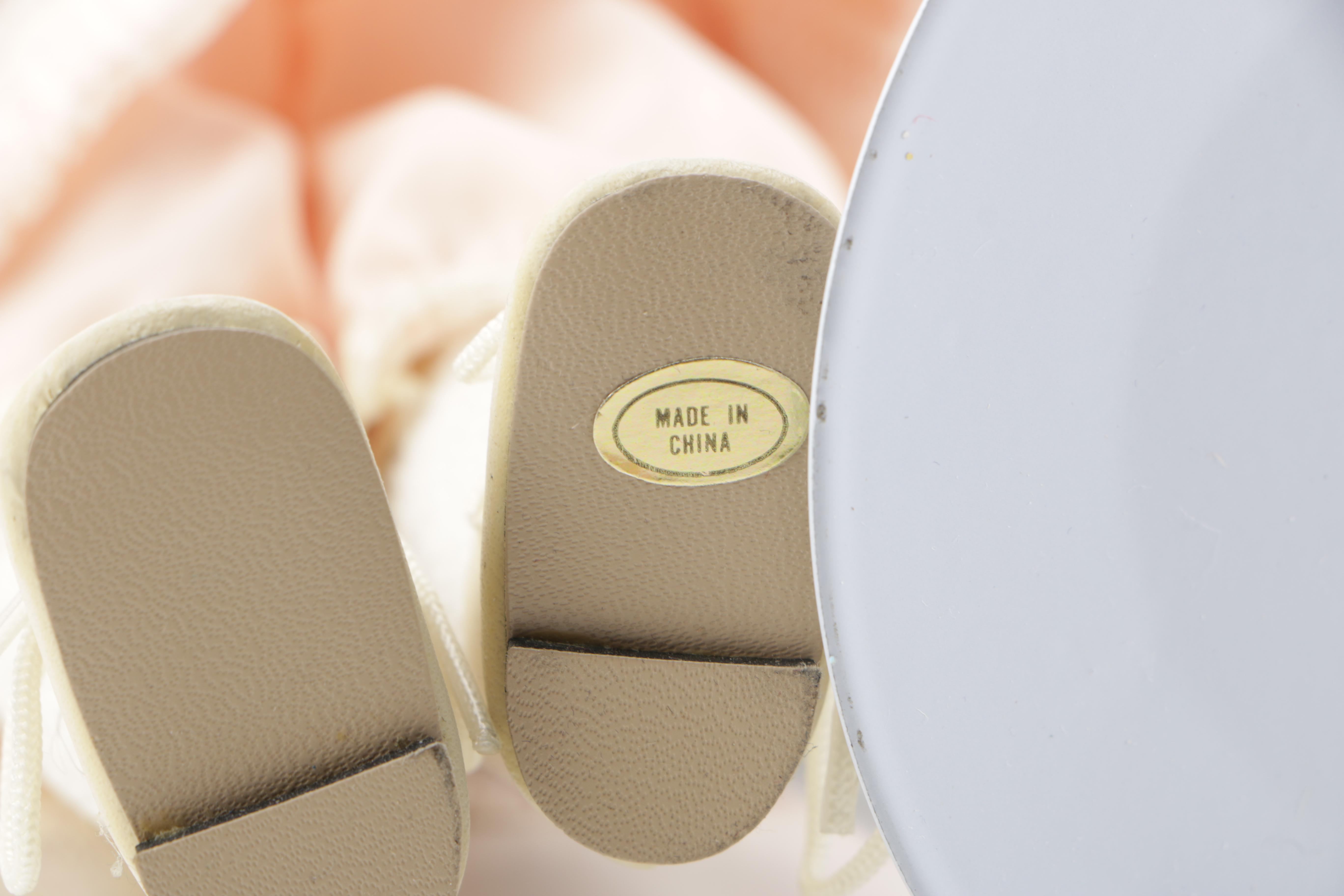 Porcelain Dolls and Plastic Doll