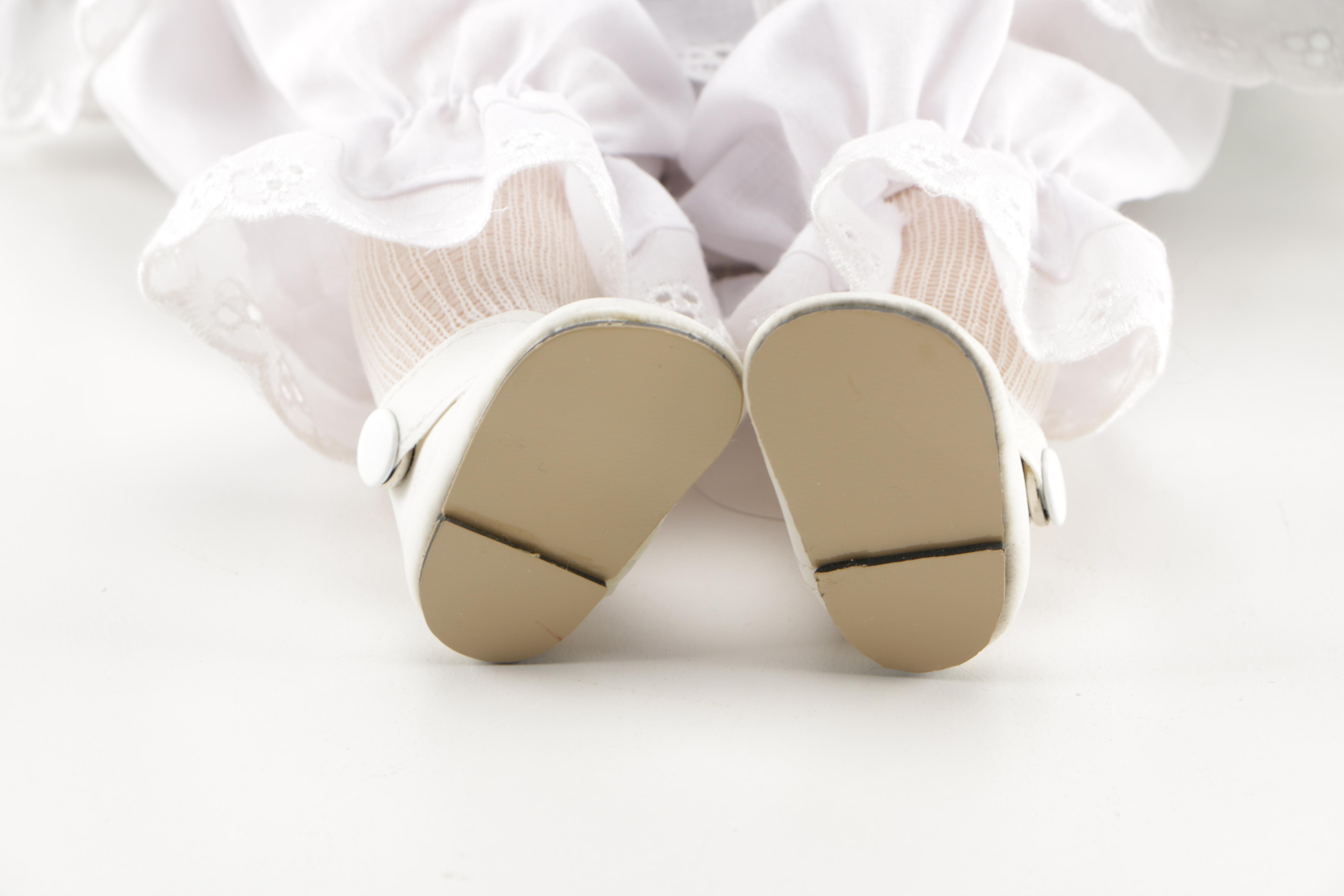 Porcelain Dolls and Plastic Doll