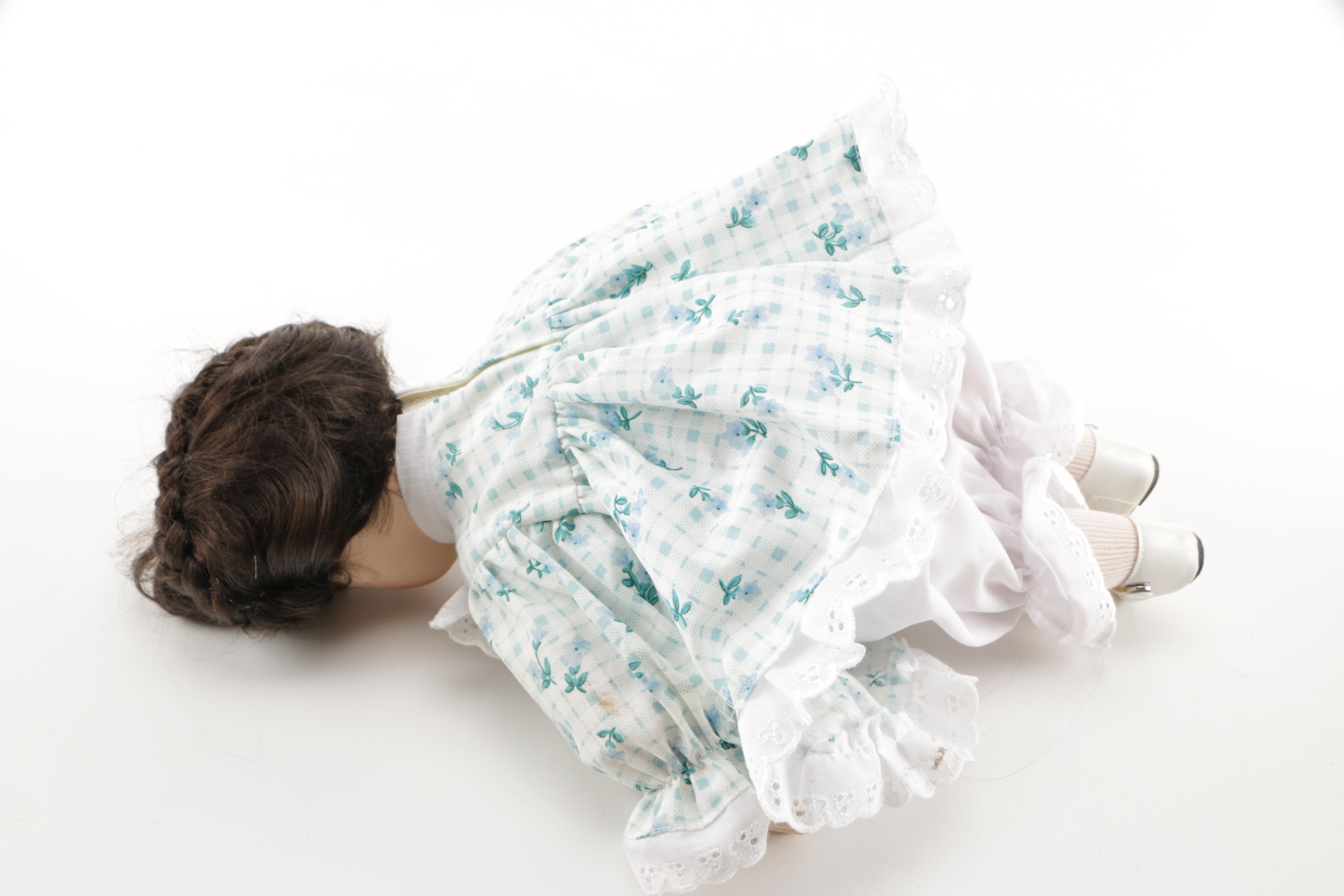 Porcelain Dolls and Plastic Doll