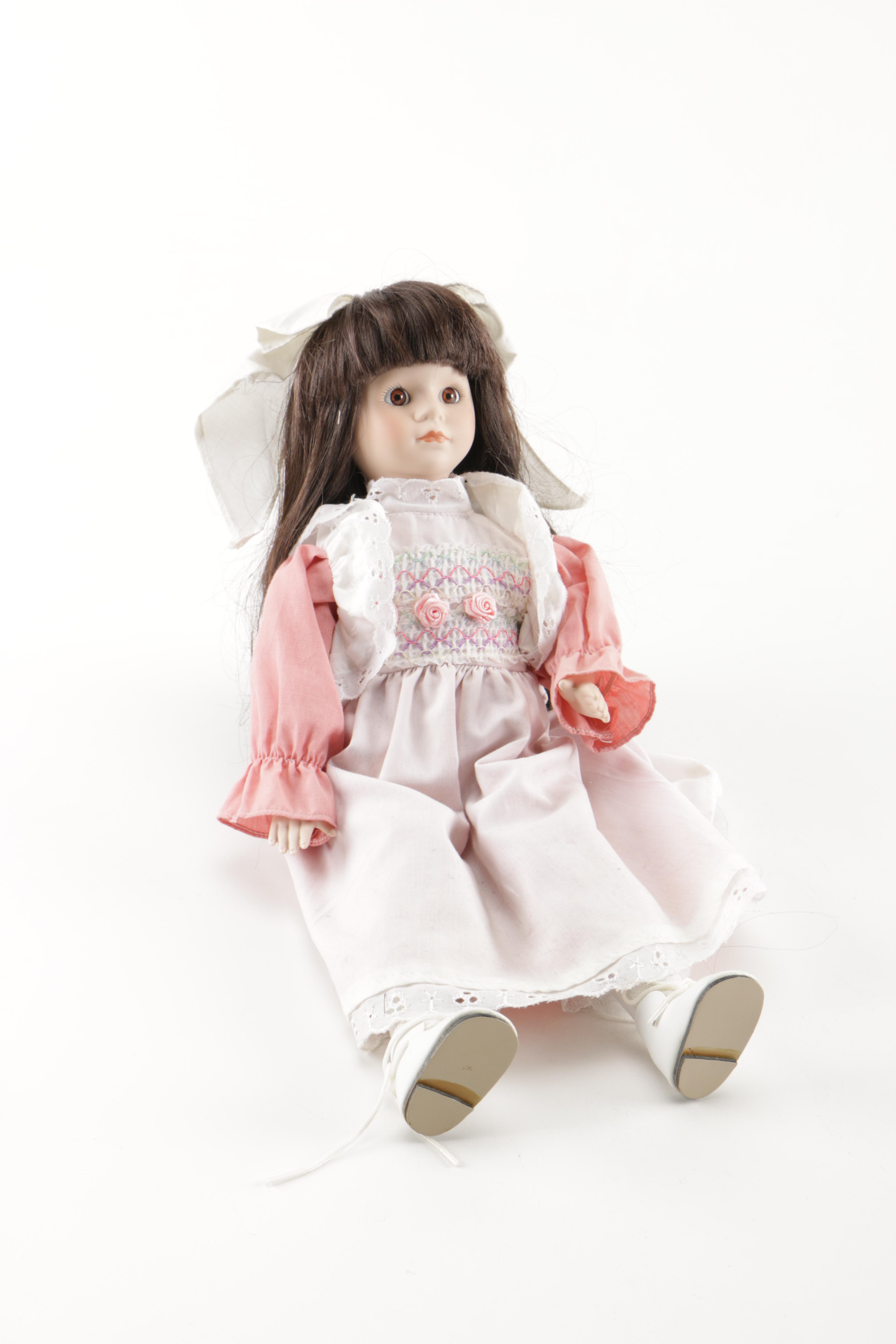 Porcelain Dolls and Plastic Doll