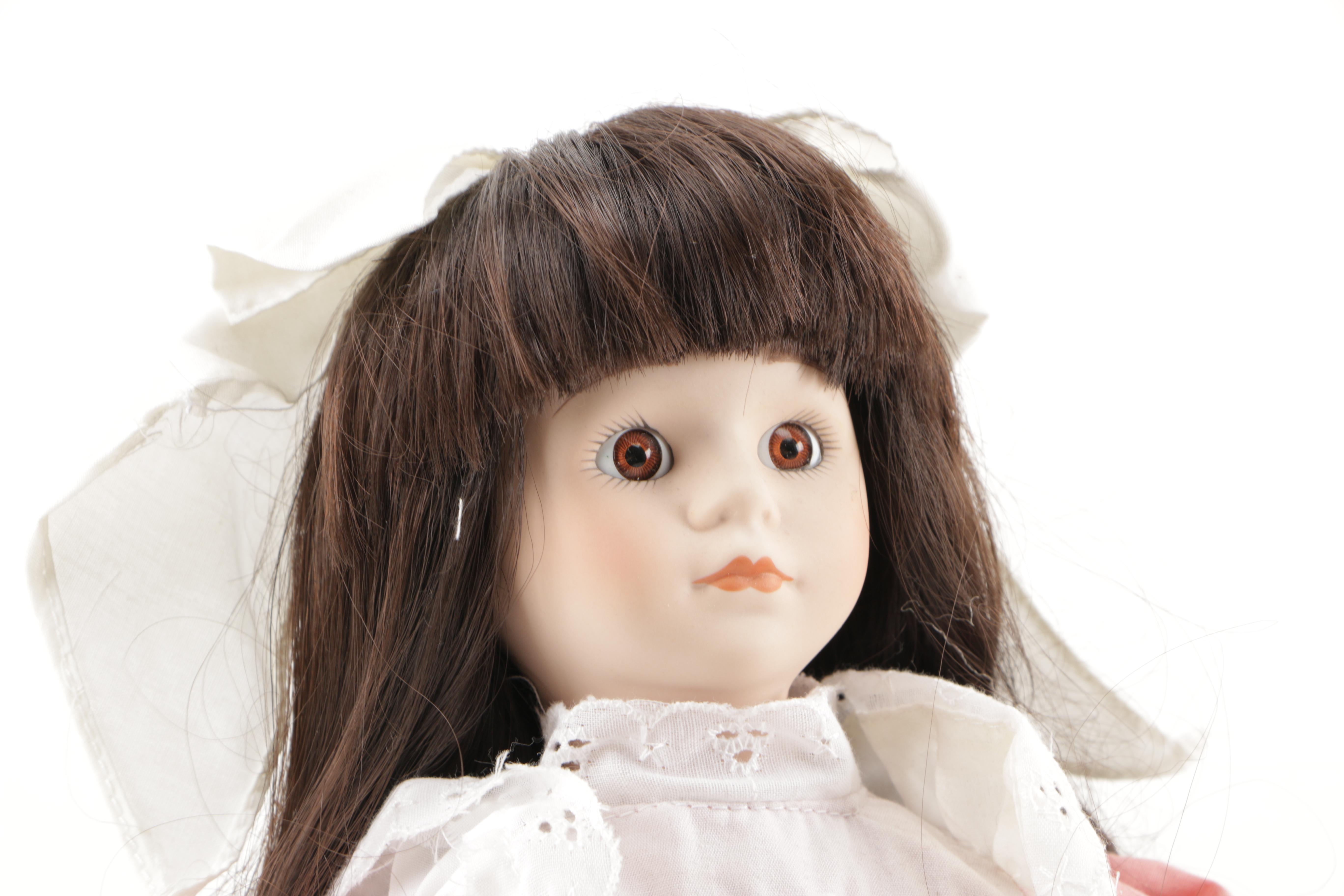 Porcelain Dolls and Plastic Doll