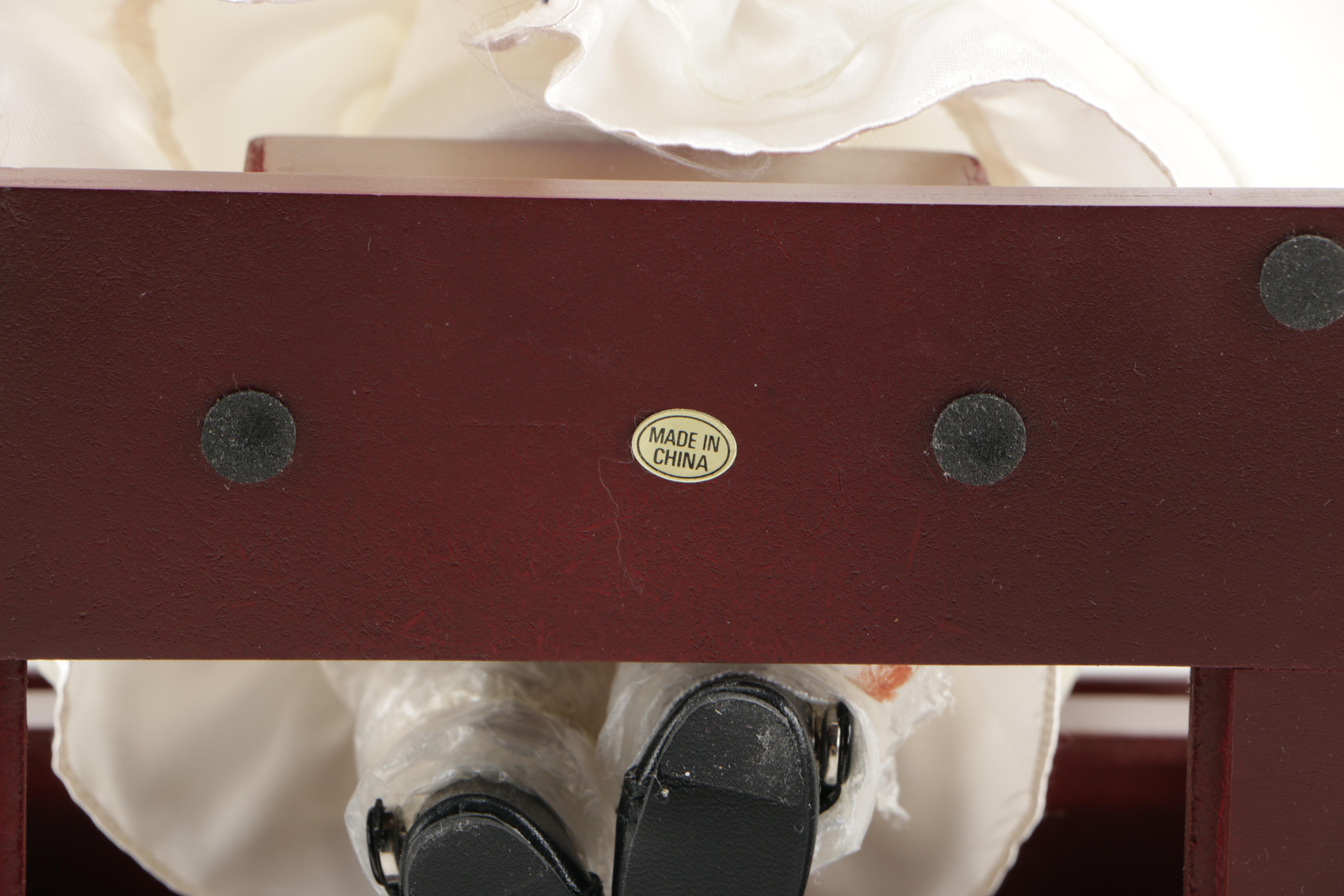 Porcelain Doll Playing Piano