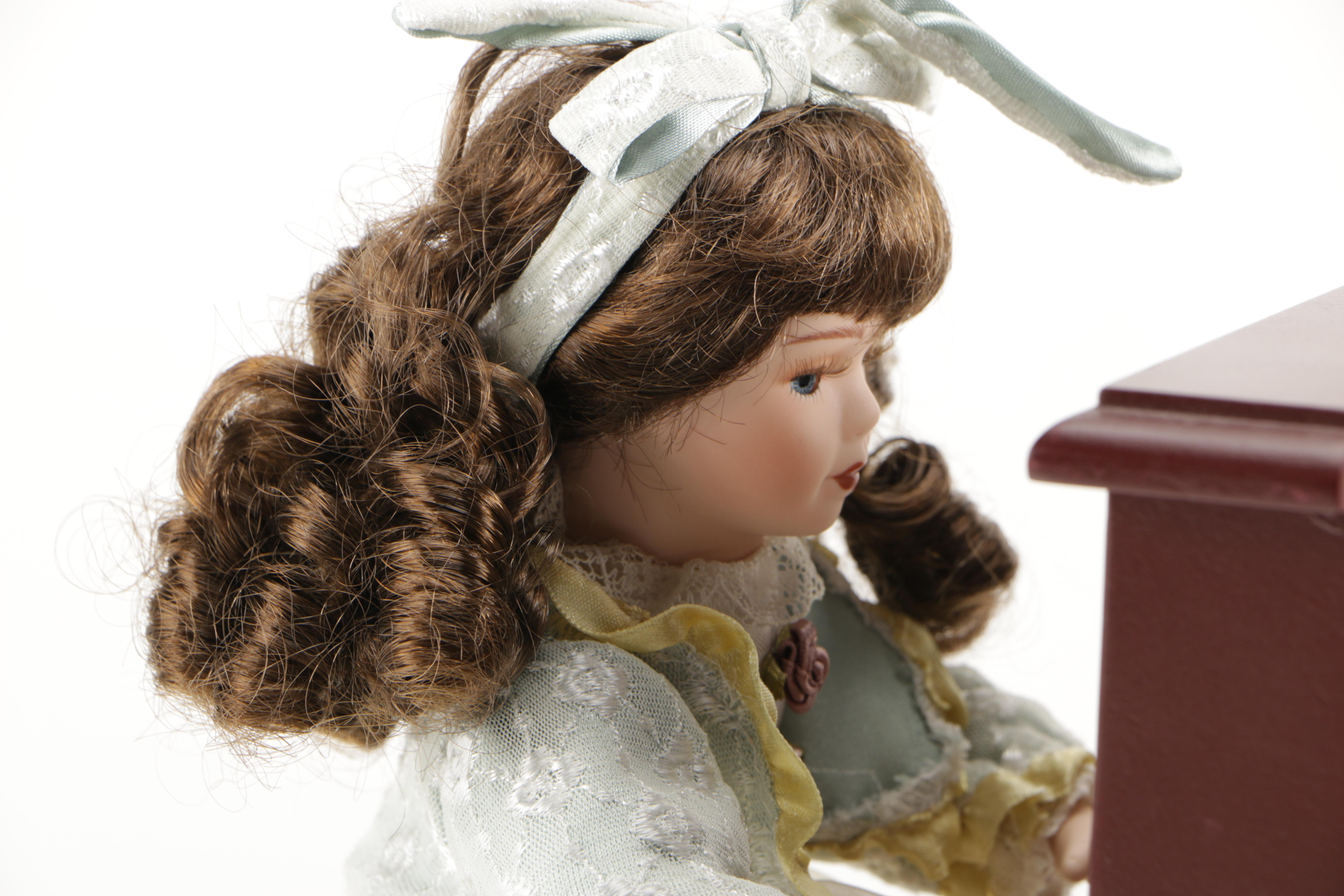 Porcelain Doll Playing Piano