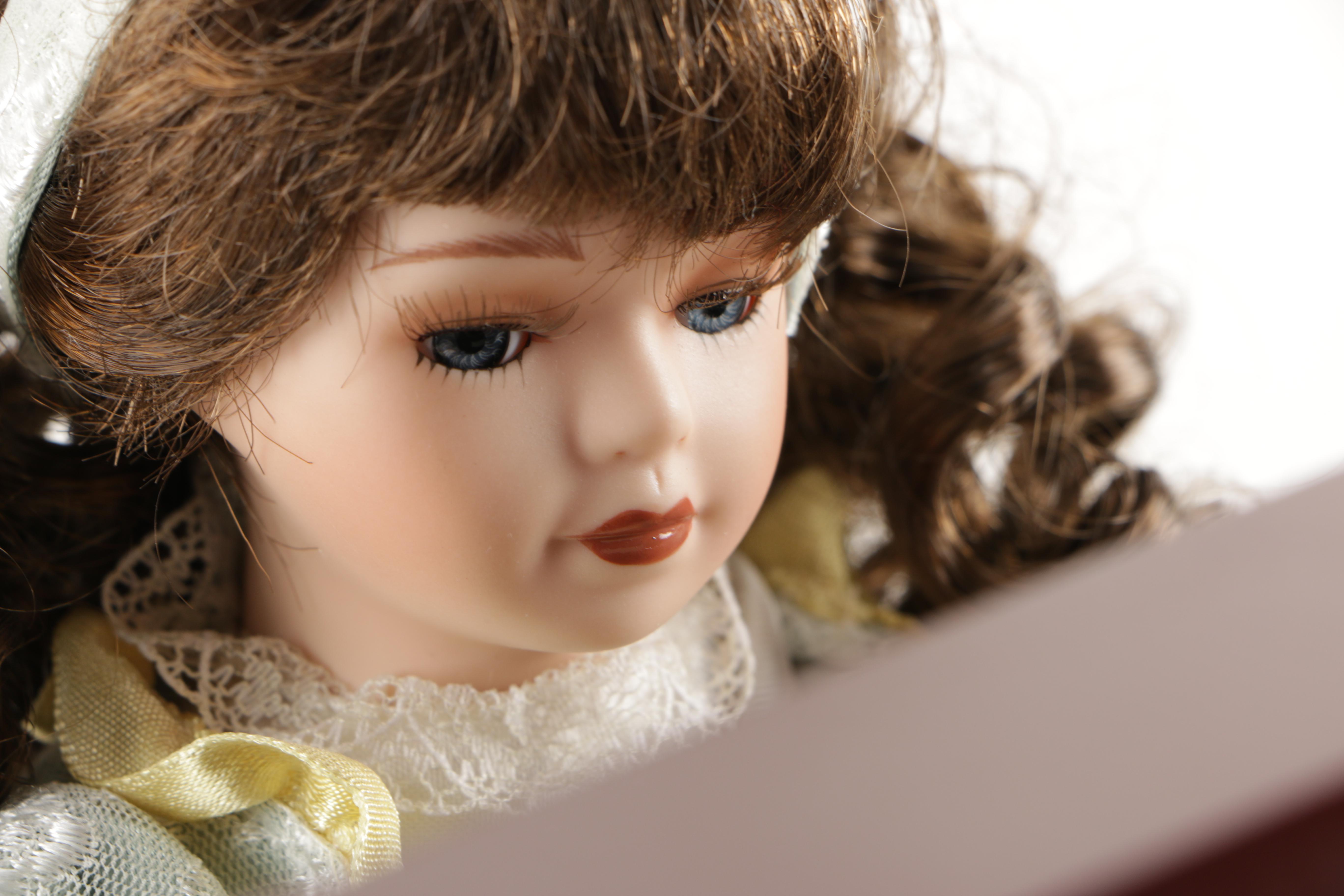 Porcelain Doll Playing Piano