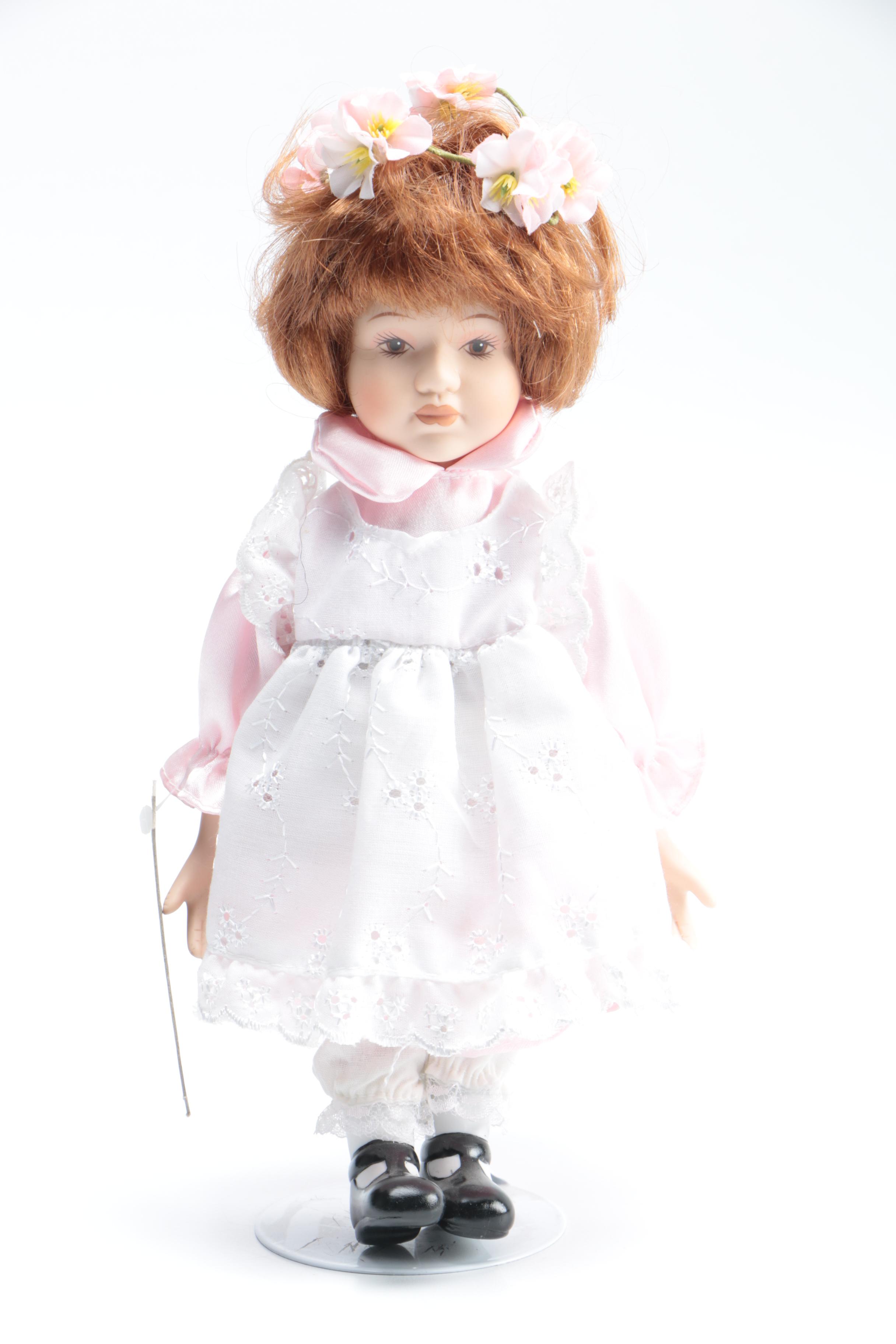 Hand-Painted and Named Porcelain Dolls