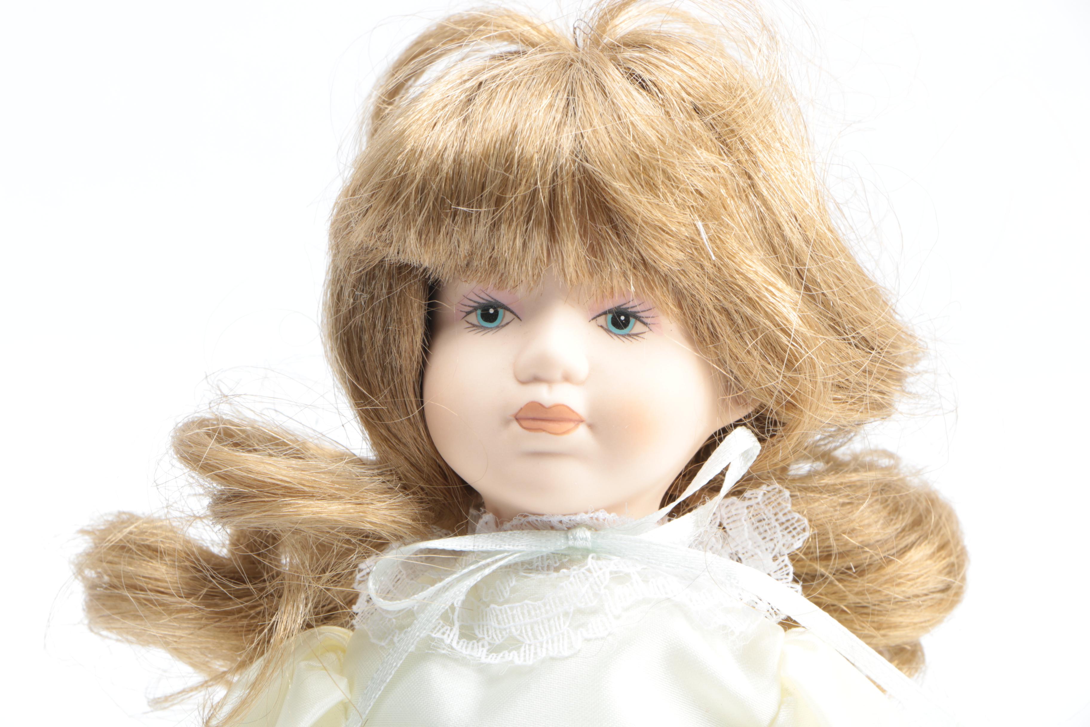 Hand-Painted and Named Porcelain Dolls