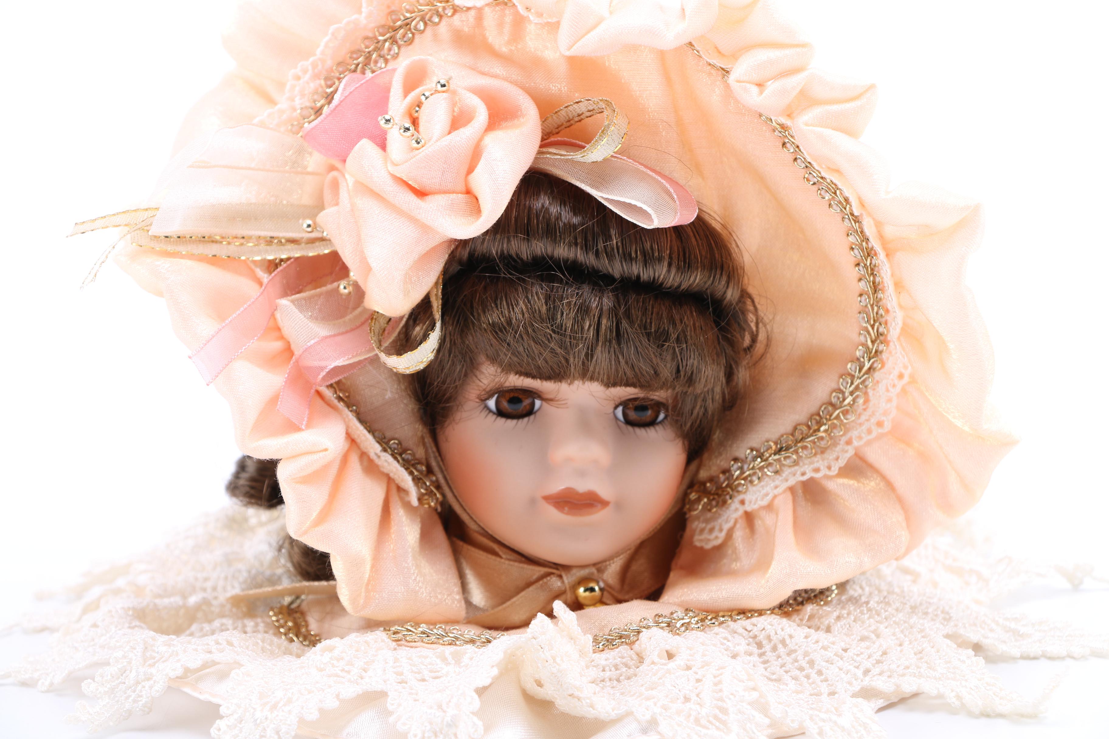 Porcelain Doll Ornaments and Doll Heads