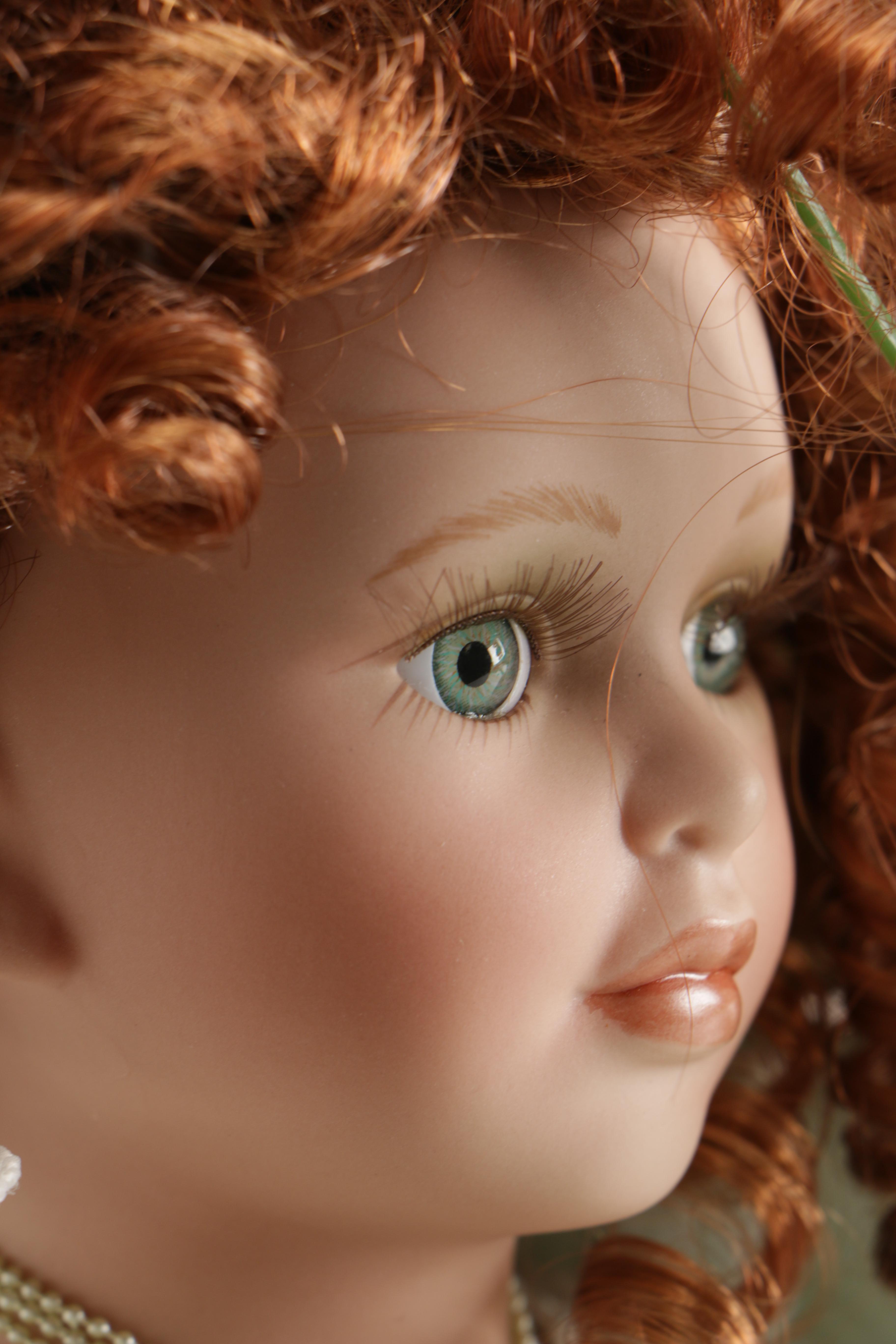 Cathay Collection Porcelain Doll on Swing