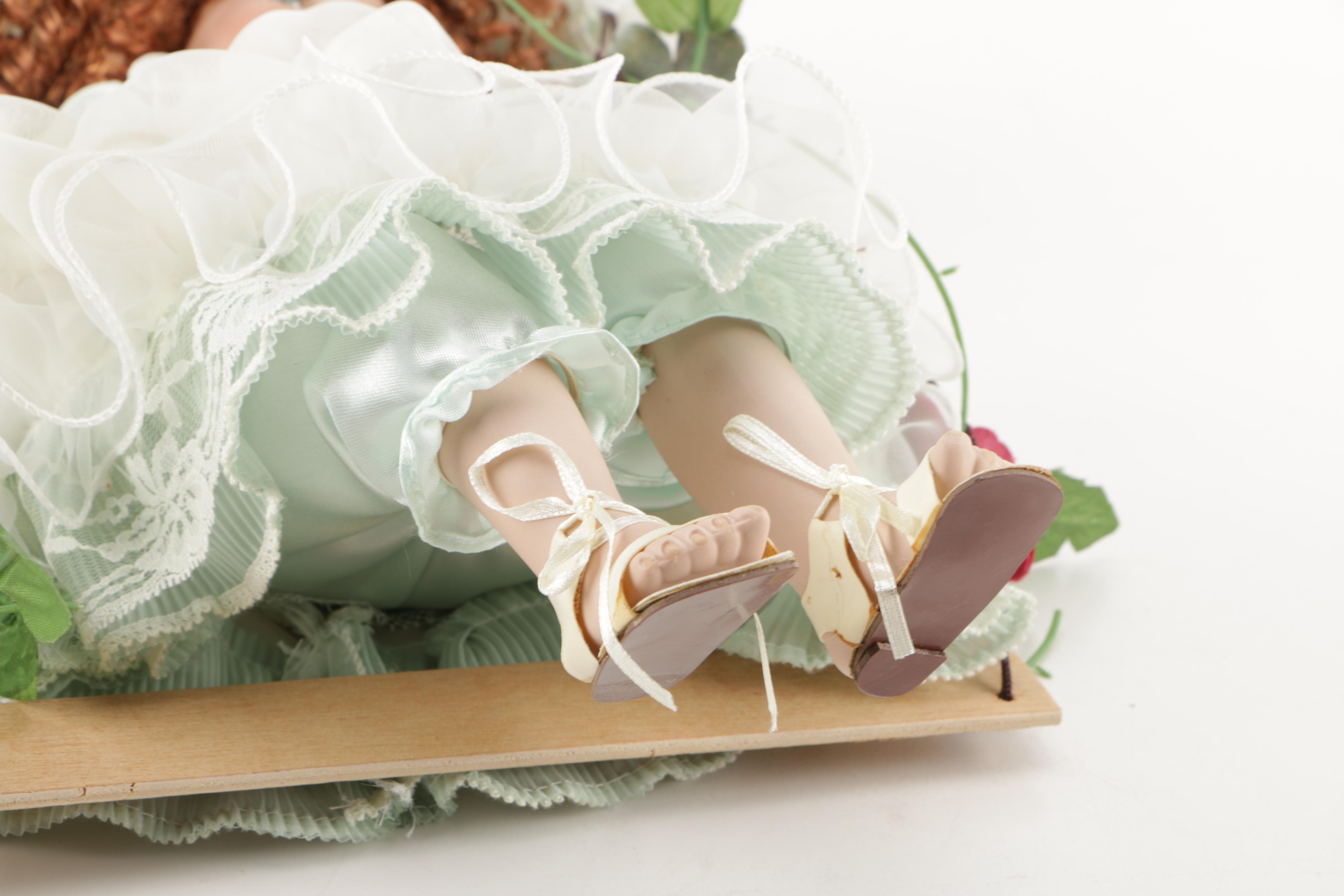 Cathay Collection Porcelain Doll on Swing