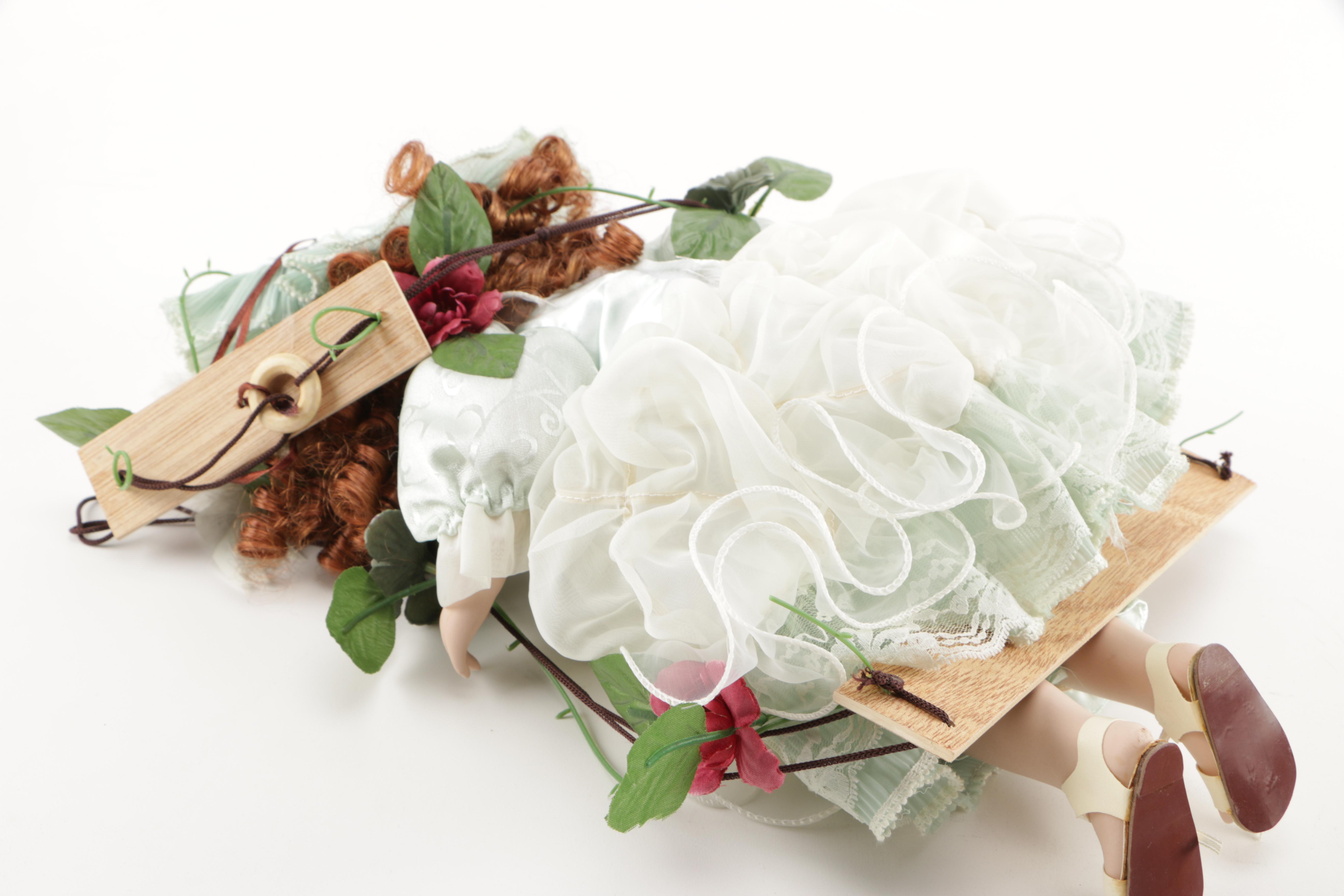 Cathay Collection Porcelain Doll on Swing