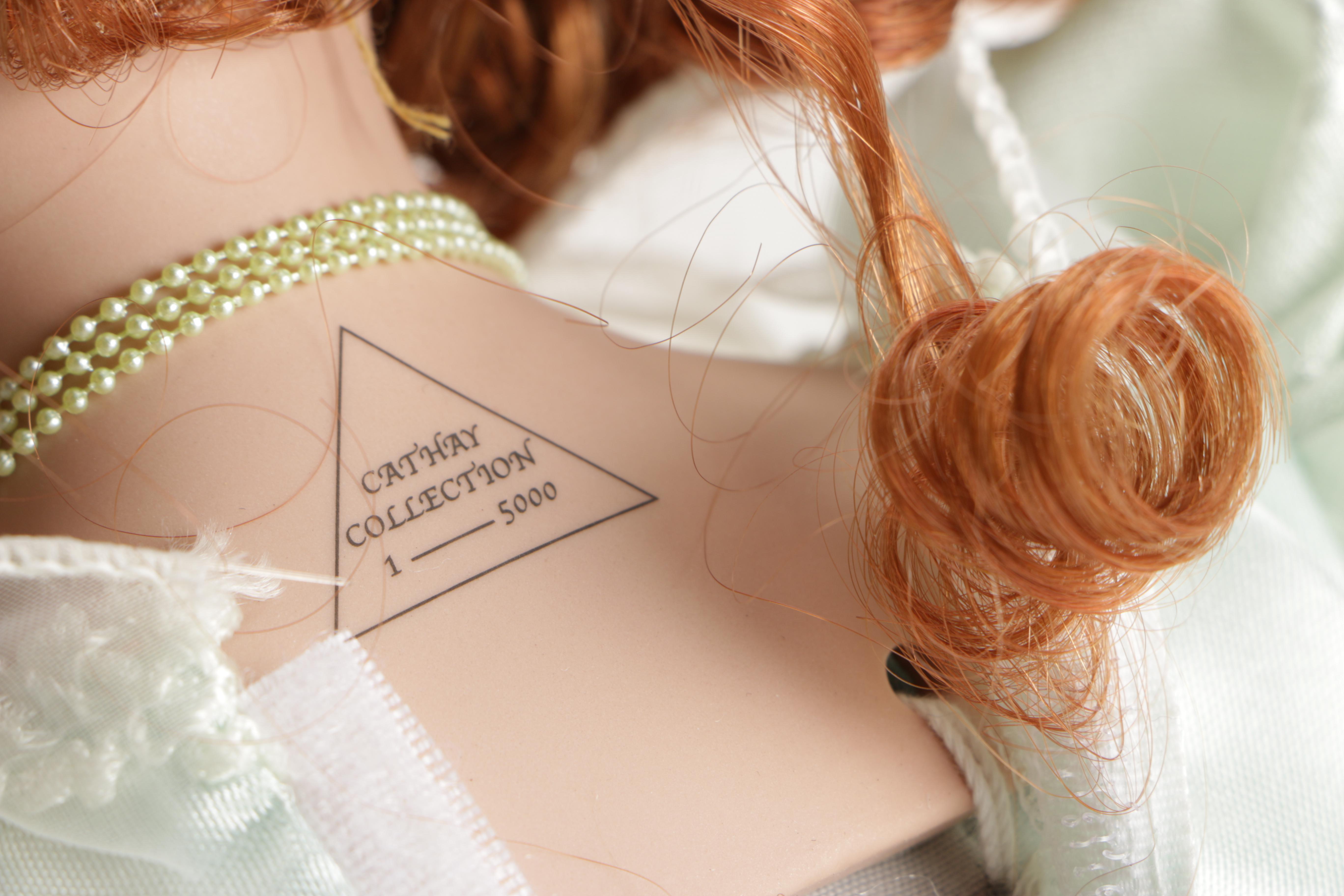 Cathay Collection Porcelain Doll on Swing