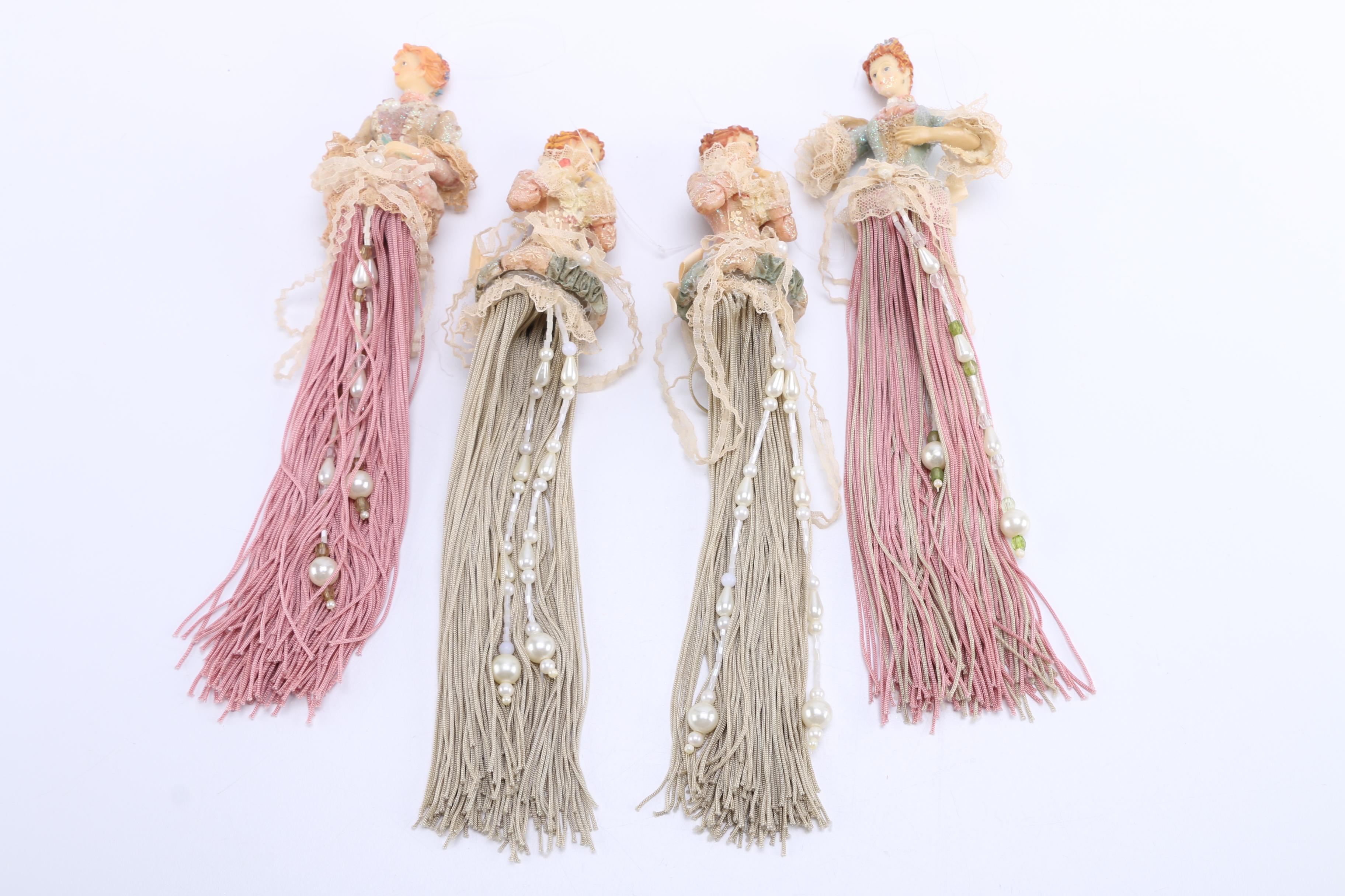 Assortment of Carved Wooden Dolls