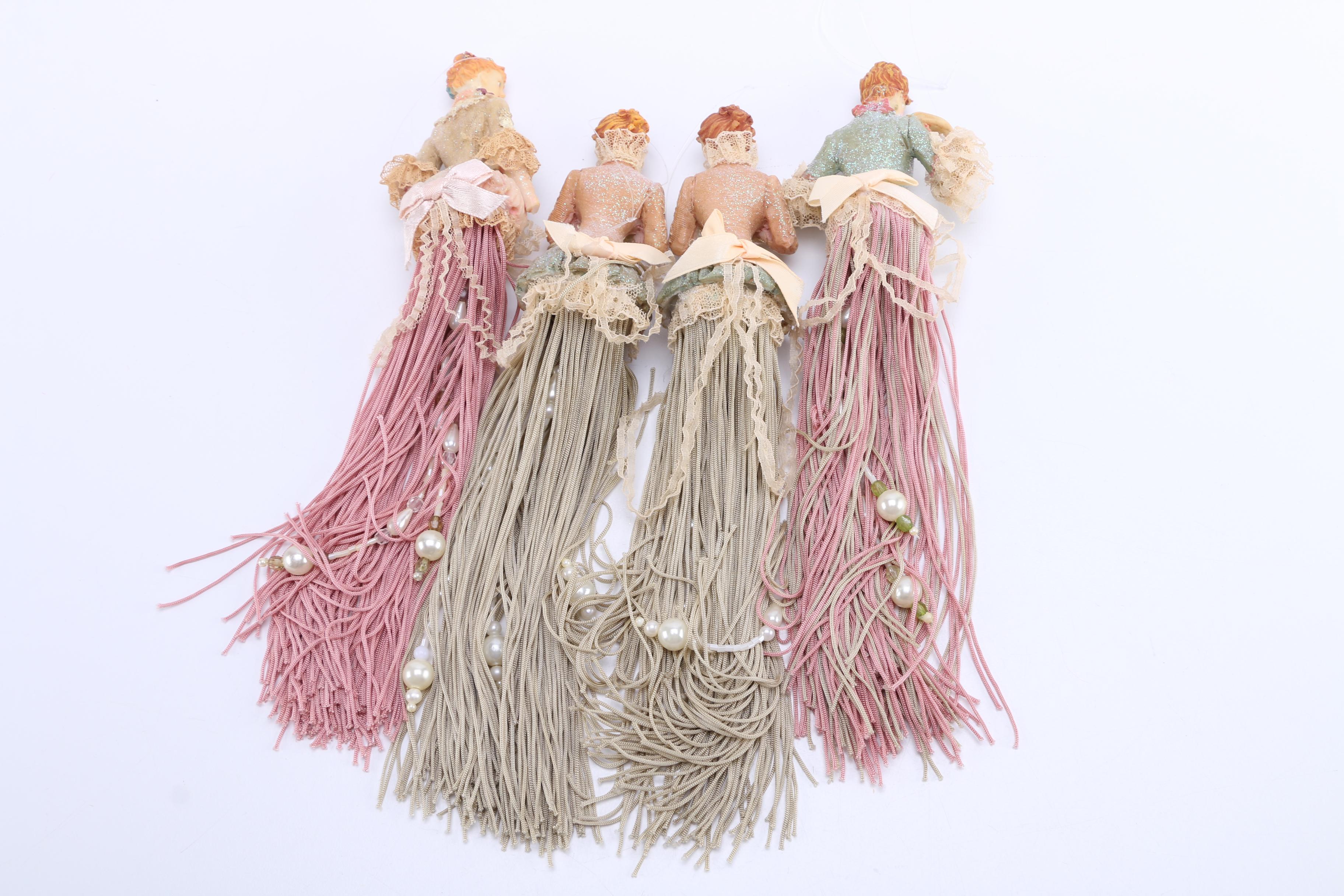 Assortment of Carved Wooden Dolls