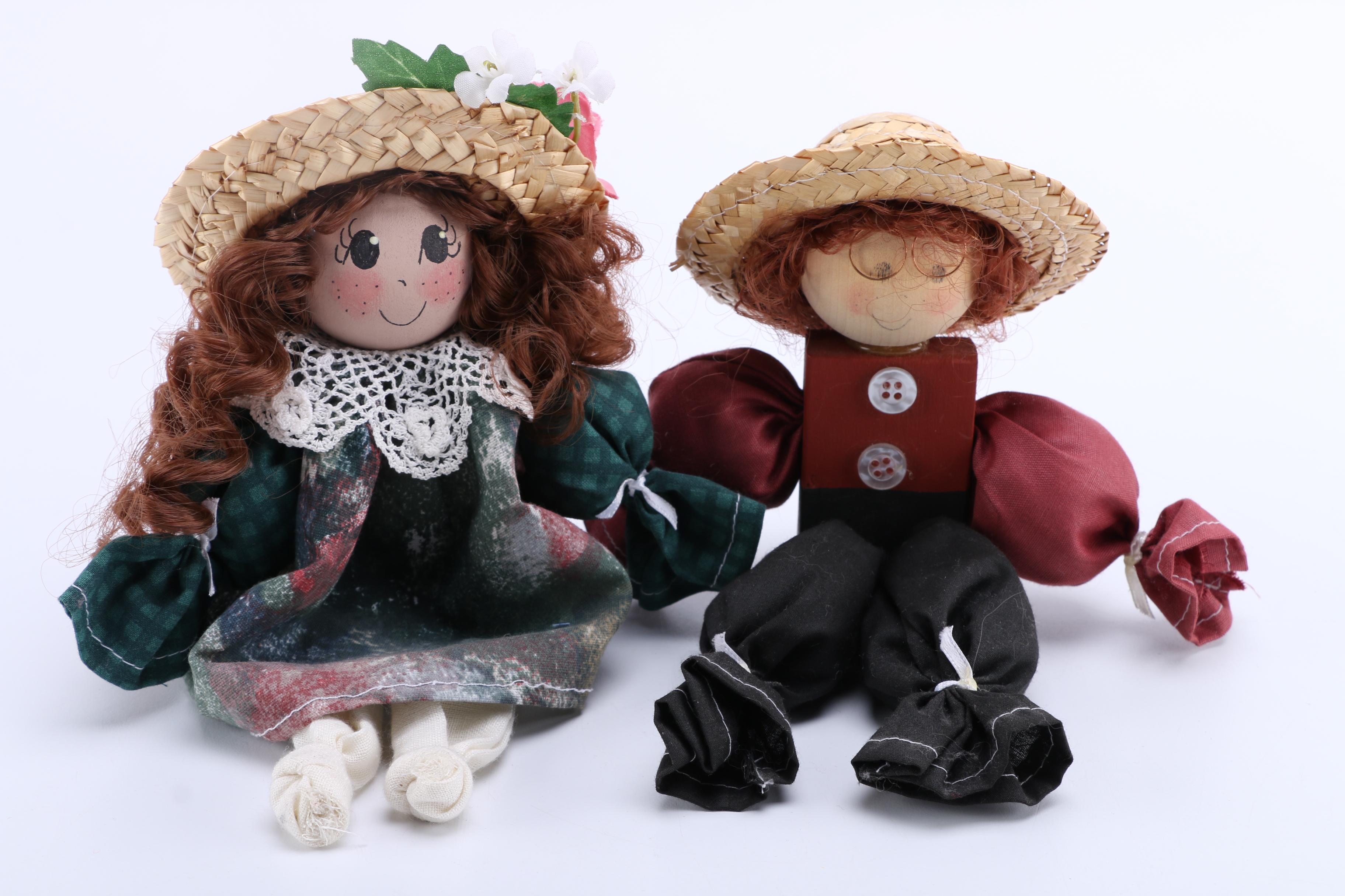 Assortment of Carved Wooden Dolls