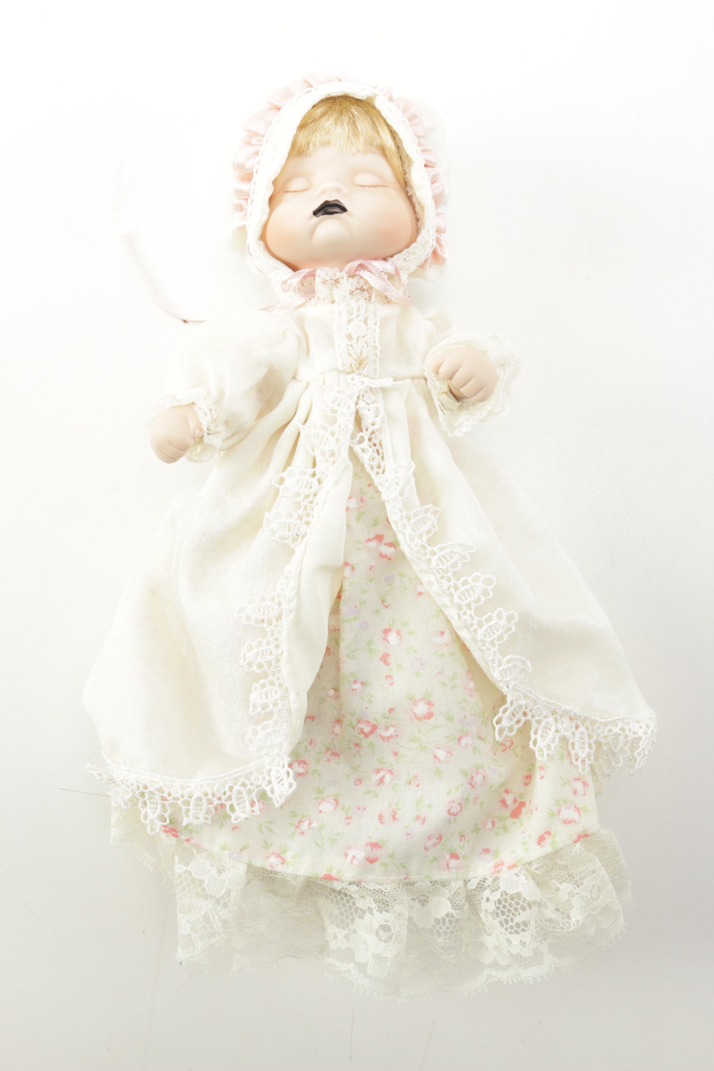 Baby Doll in Rocking Basket