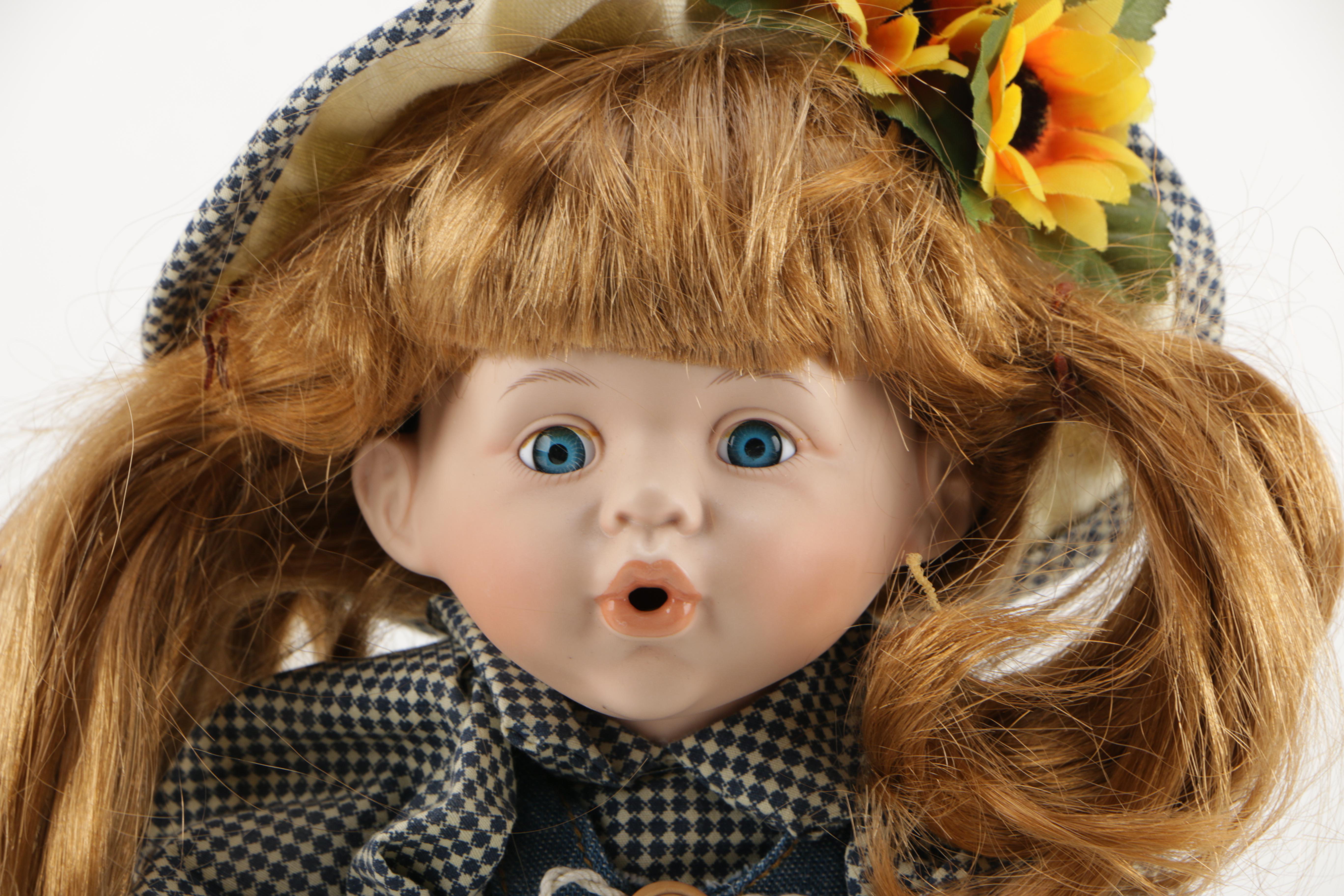 Porcelain Doll With Bird