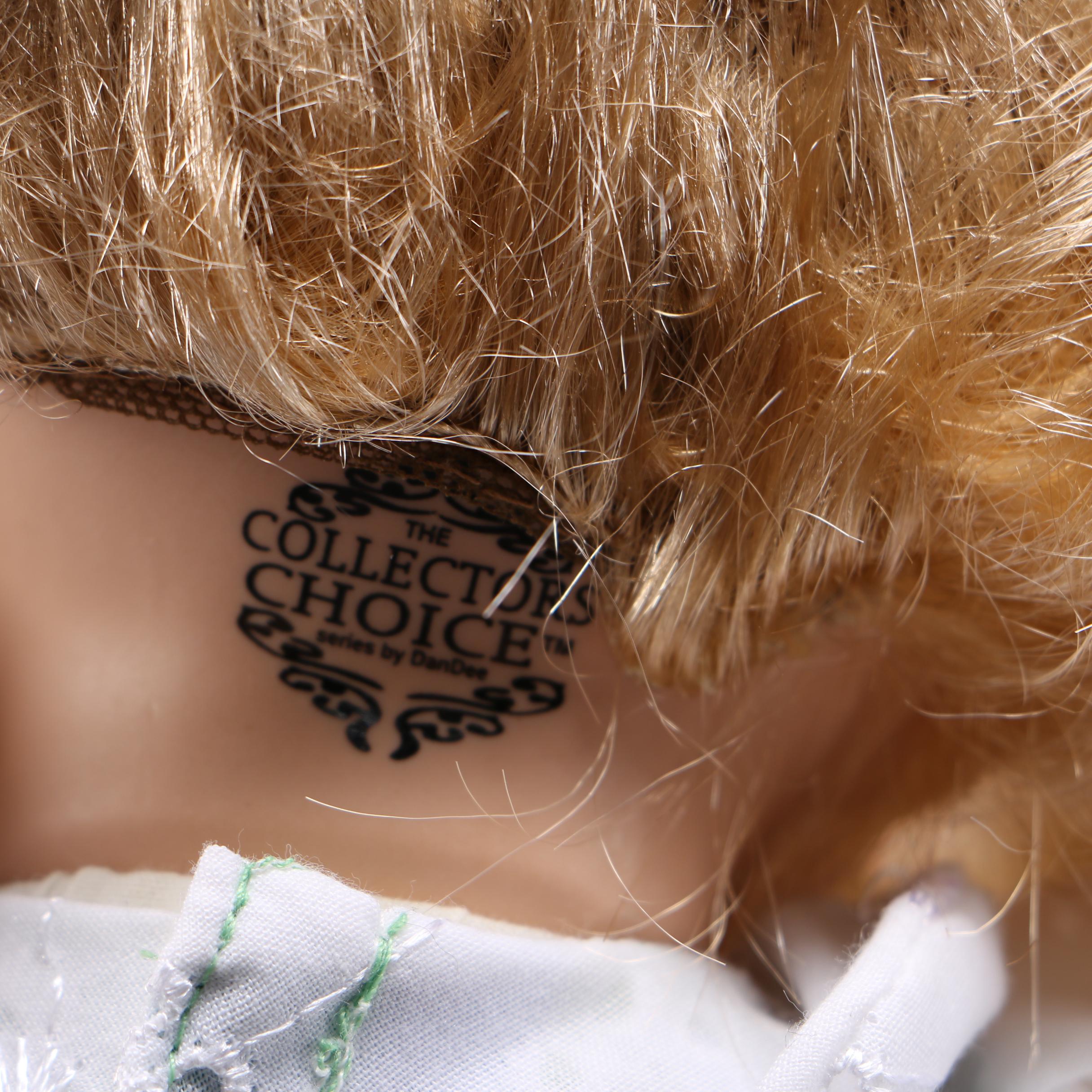 Porcelain Dolls and Accessories in Dresser