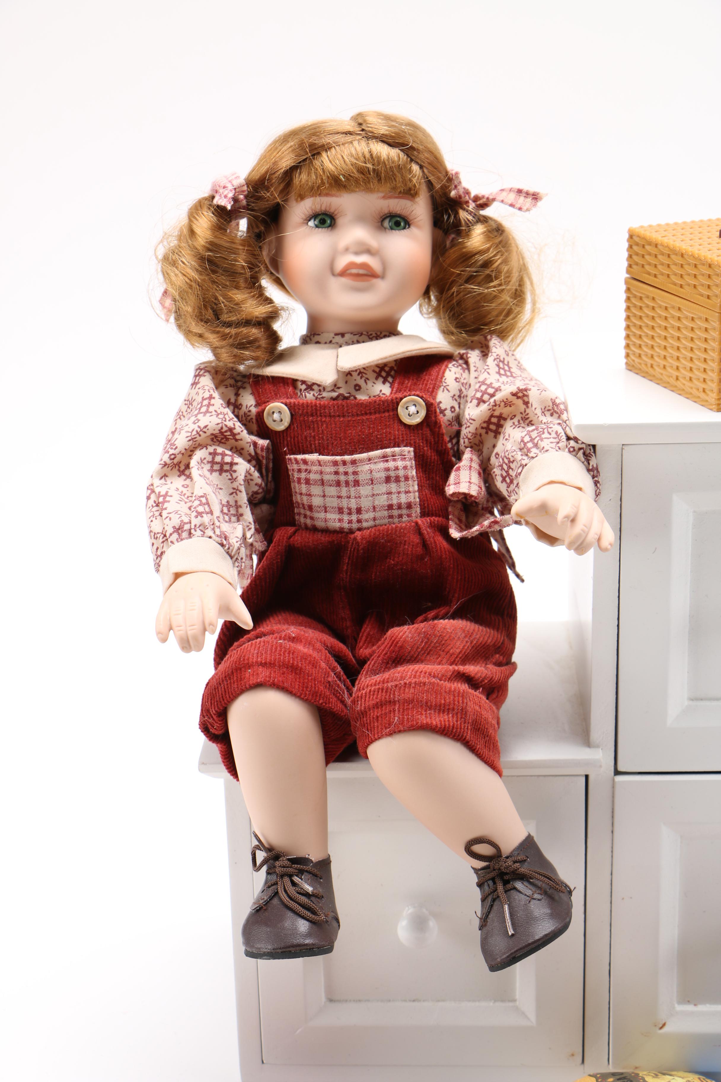 Porcelain Dolls and Accessories in Dresser