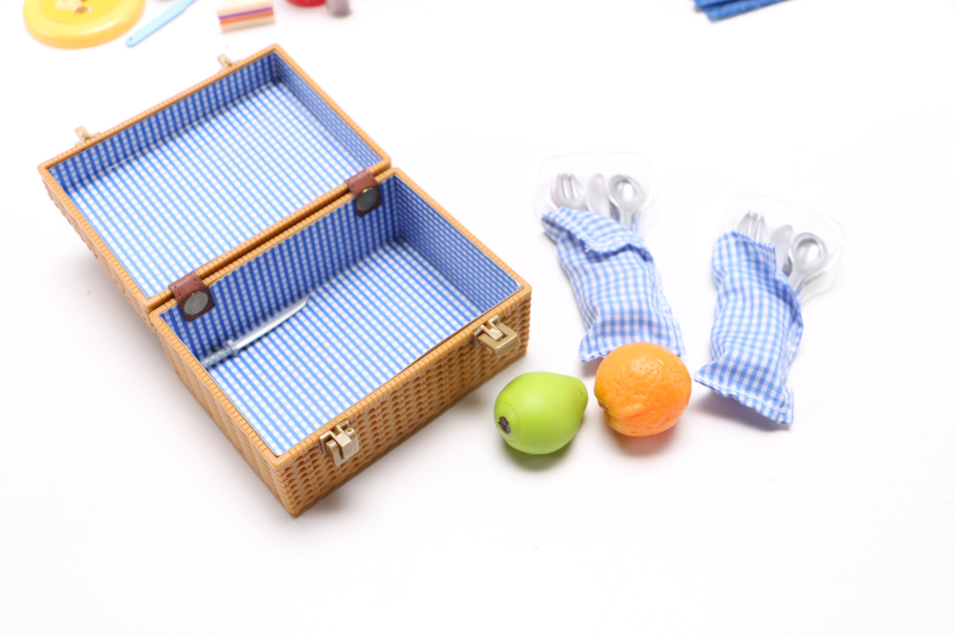 Porcelain Dolls and Accessories in Dresser