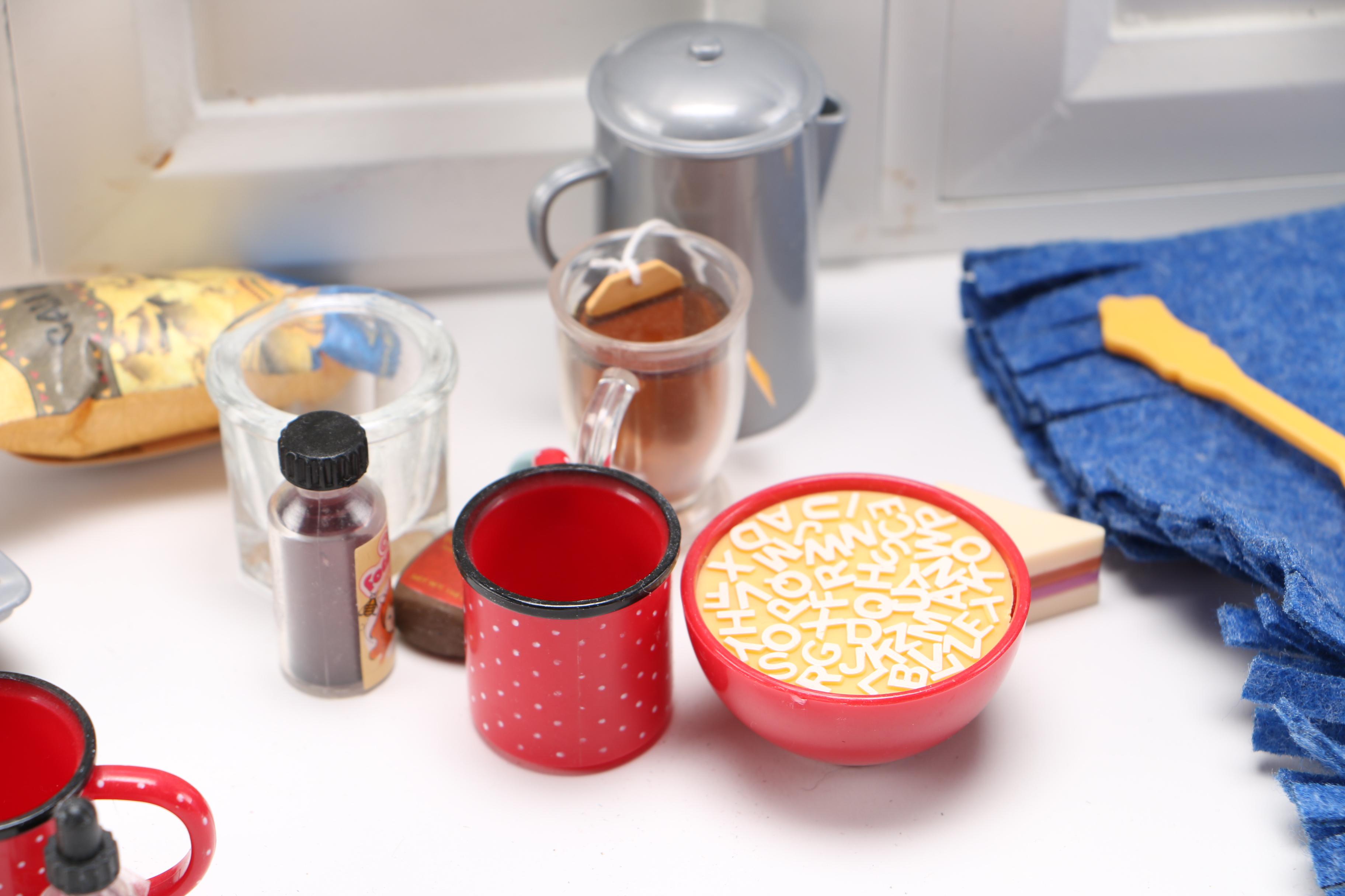 Porcelain Dolls and Accessories in Dresser