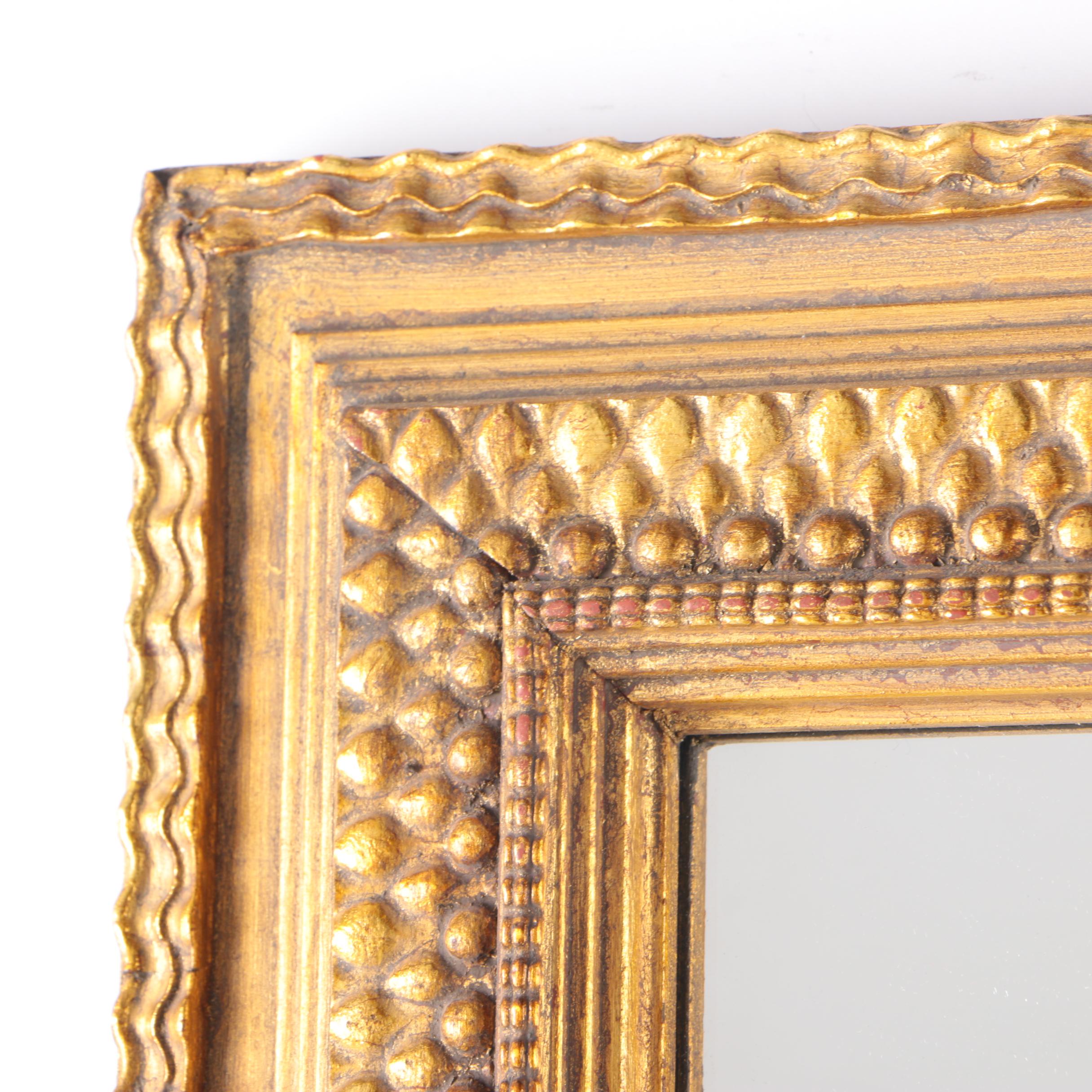 Gold Tone and Ebonized Wall Mirror
