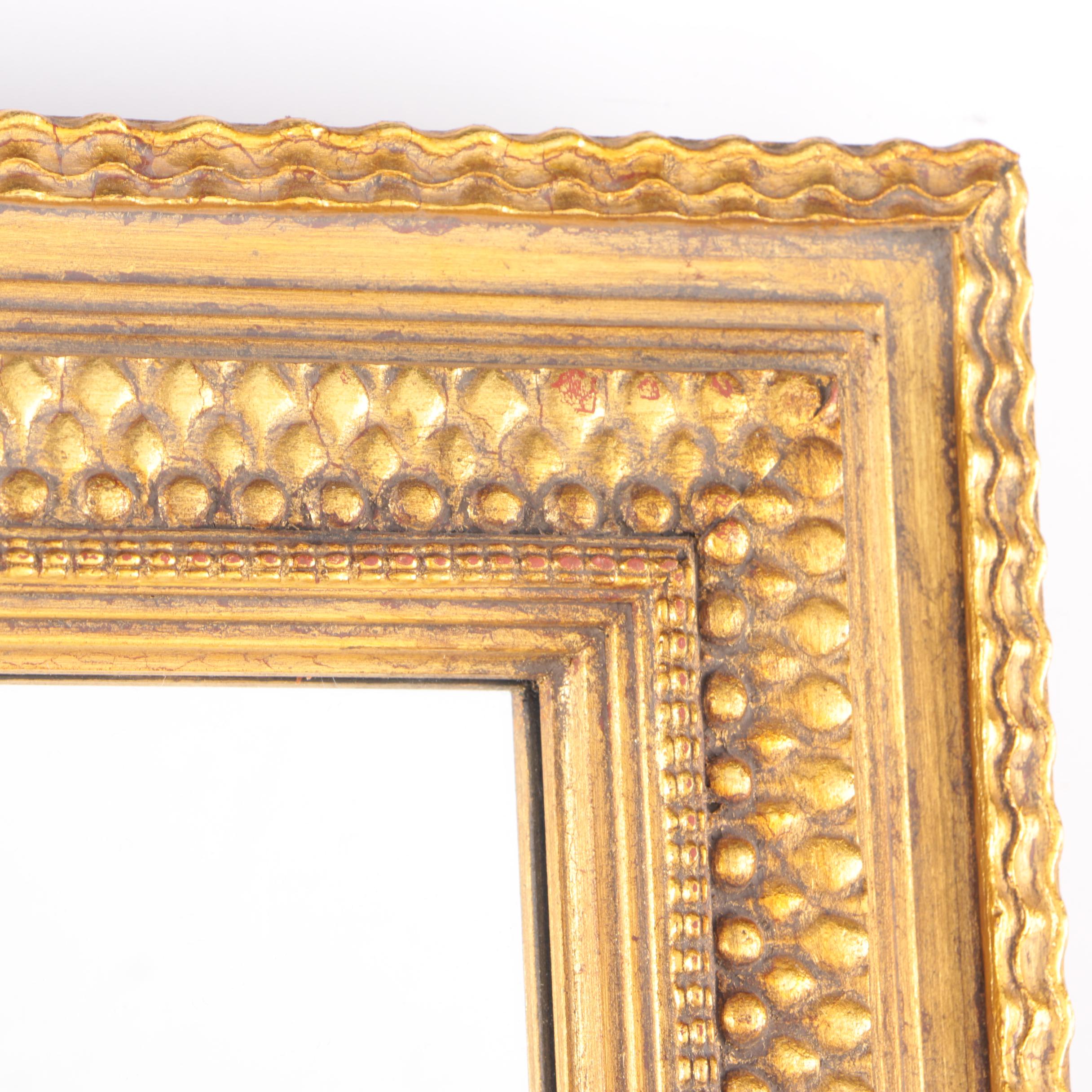 Gold Tone and Ebonized Wall Mirror