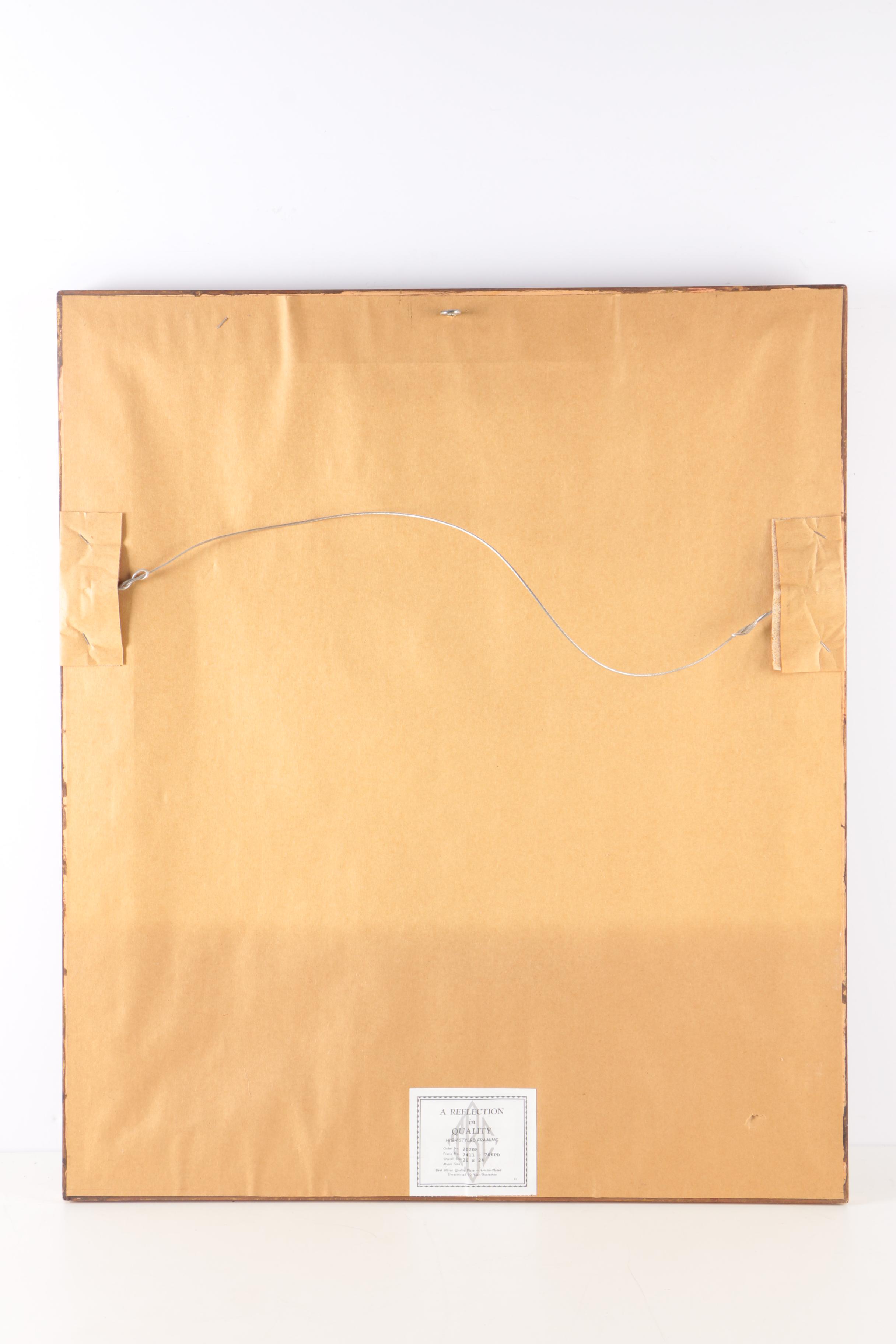 Gold Tone and Ebonized Wall Mirror