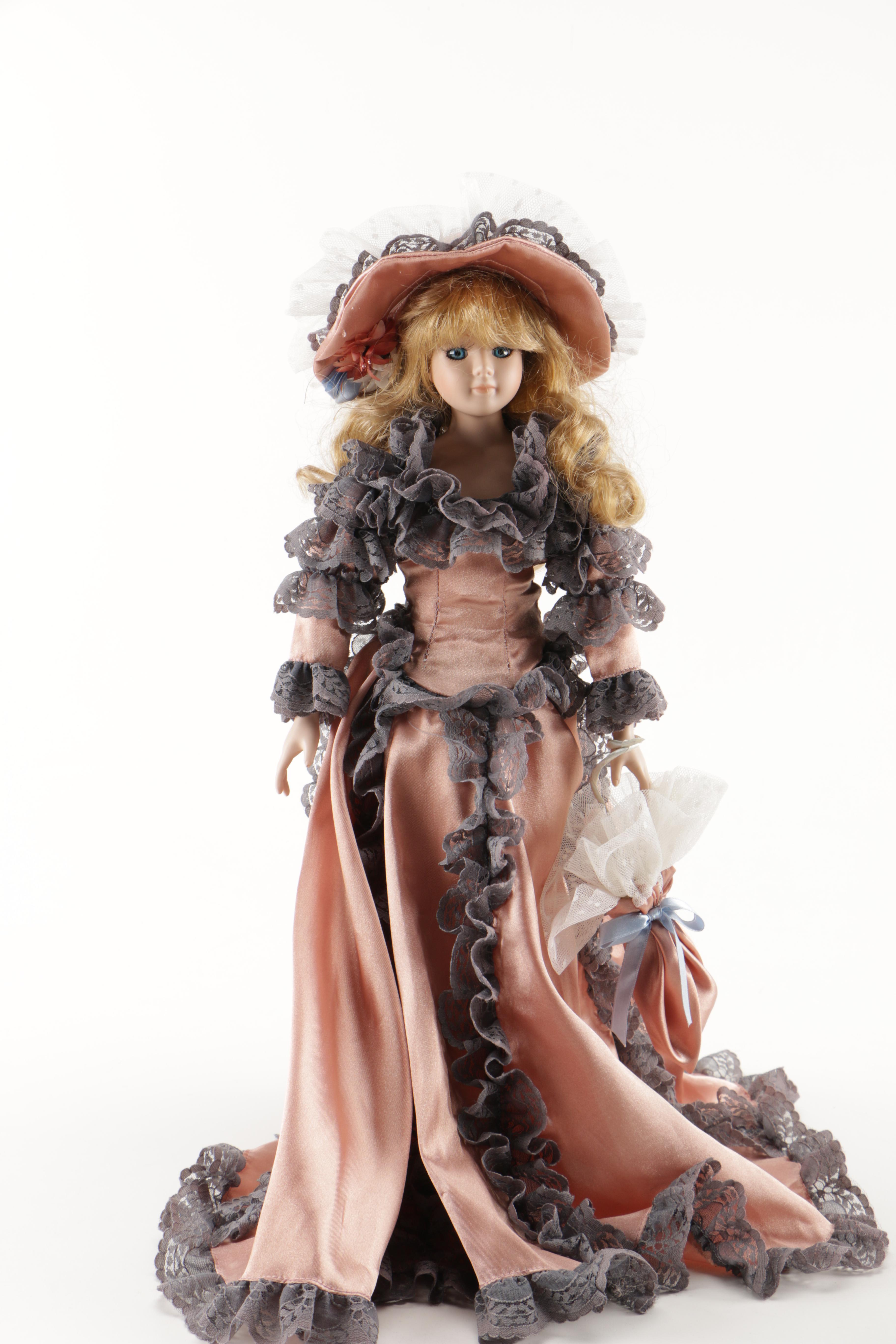 Assortment of Porcelain Dolls in Pink Dresses