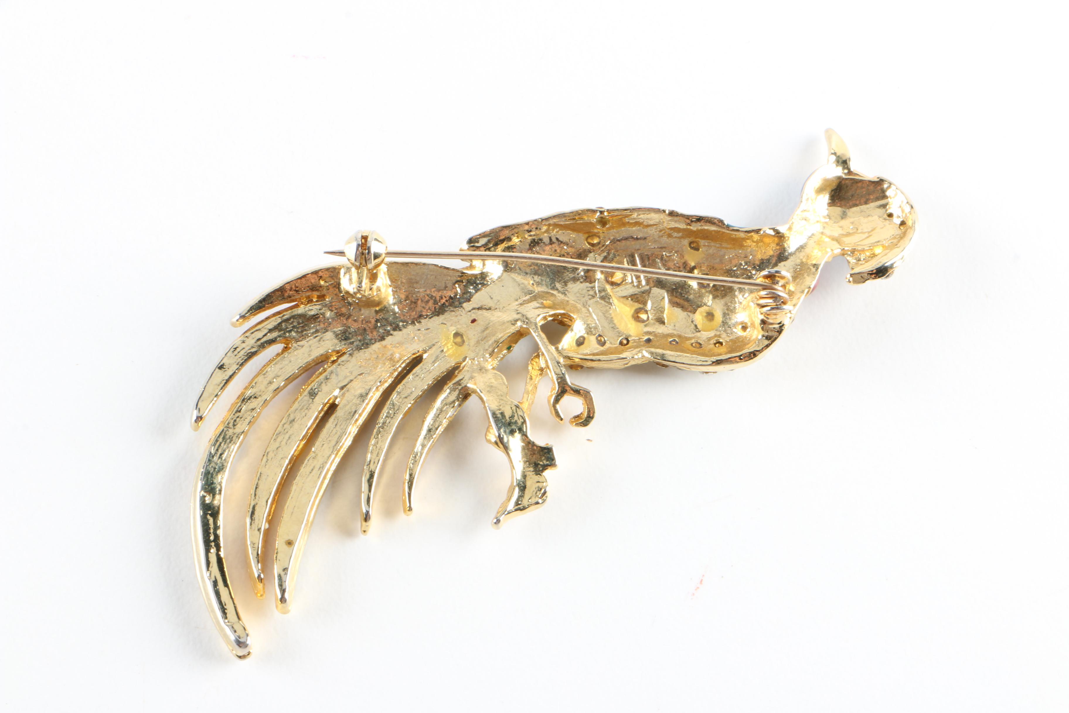 Vintage Brooches, Earrings, and a Pearl Bracelet