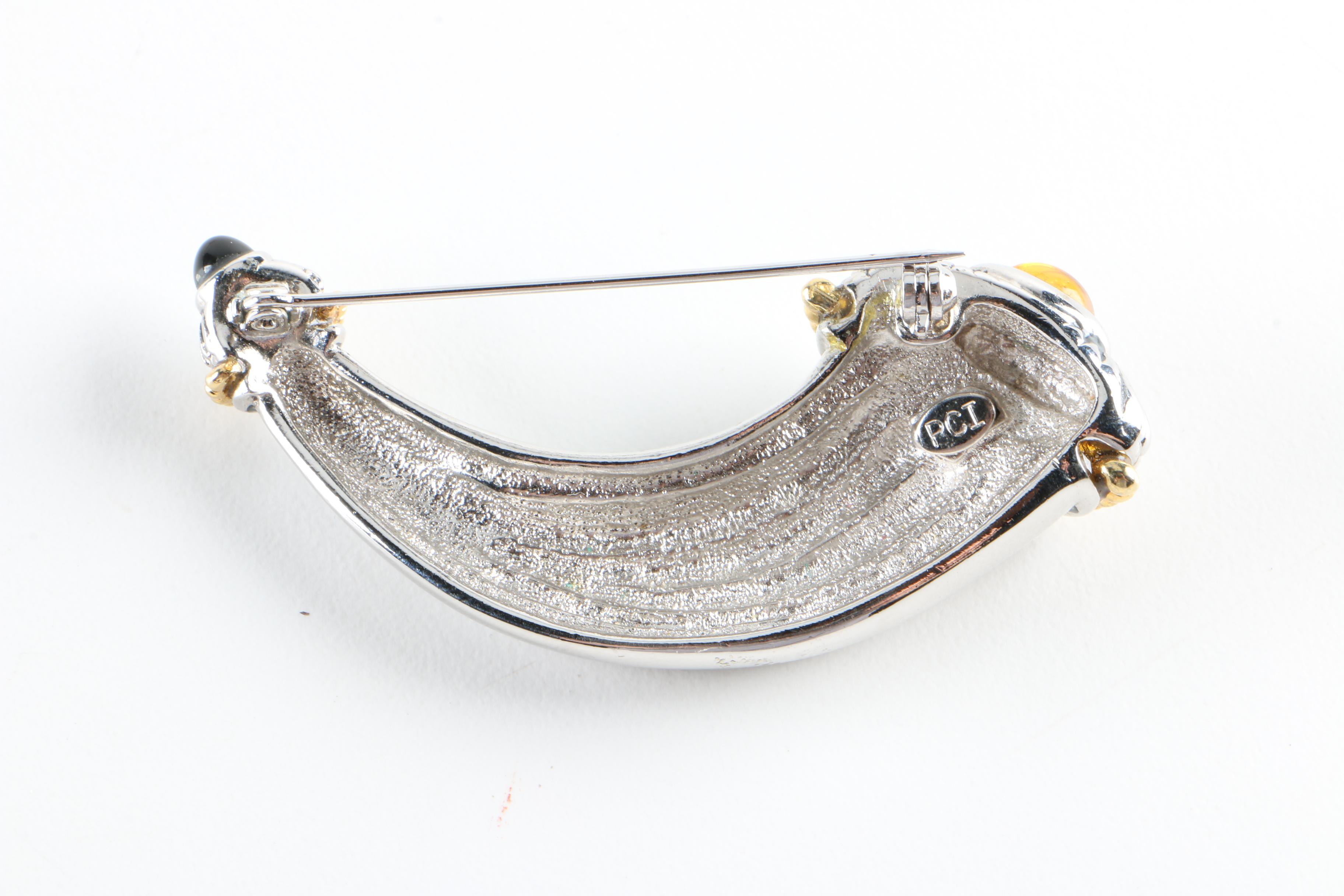 Vintage Brooches, Earrings, and a Pearl Bracelet