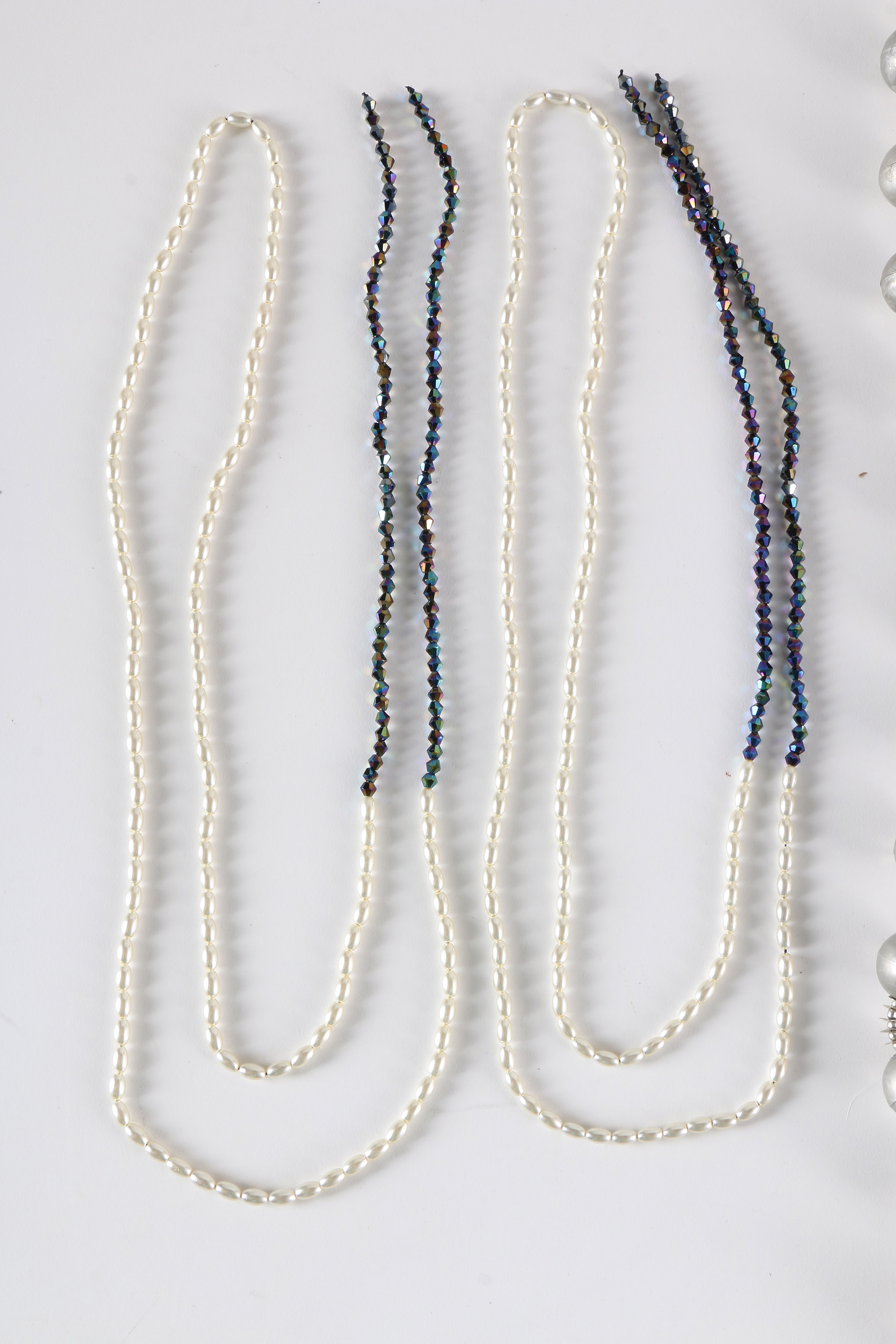 Costume Jewelry Including a Sterling Silver Pendant