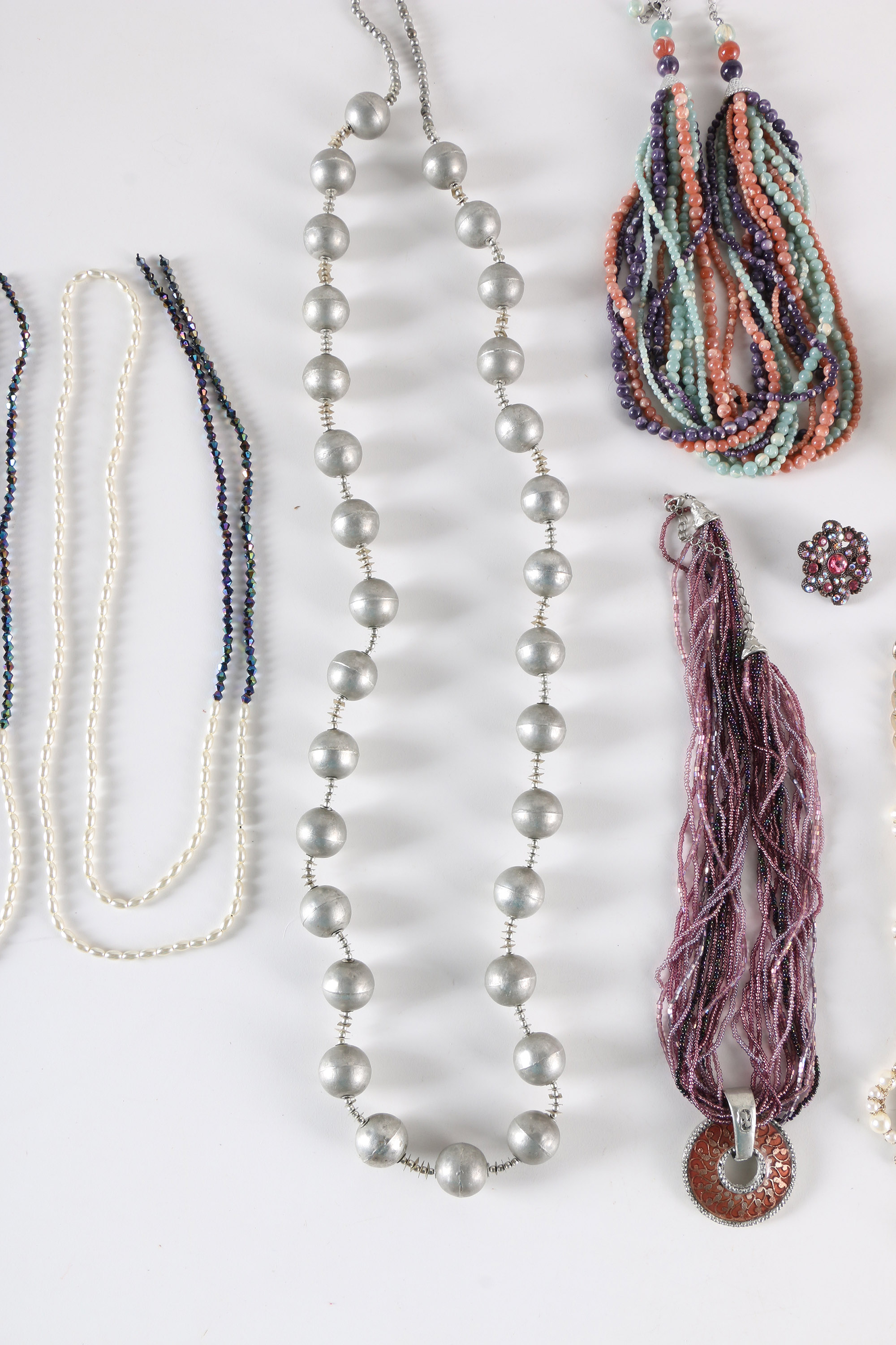 Costume Jewelry Including a Sterling Silver Pendant