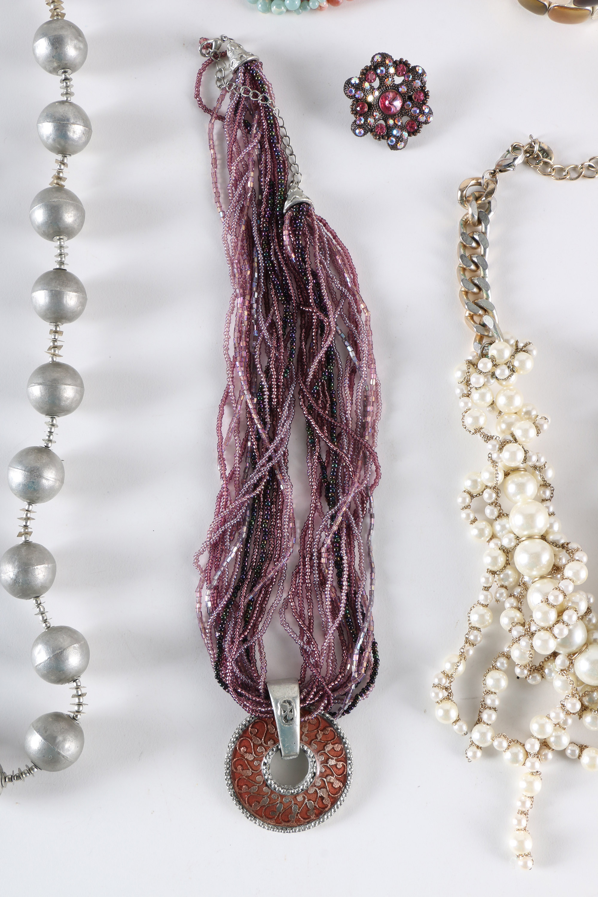 Costume Jewelry Including a Sterling Silver Pendant