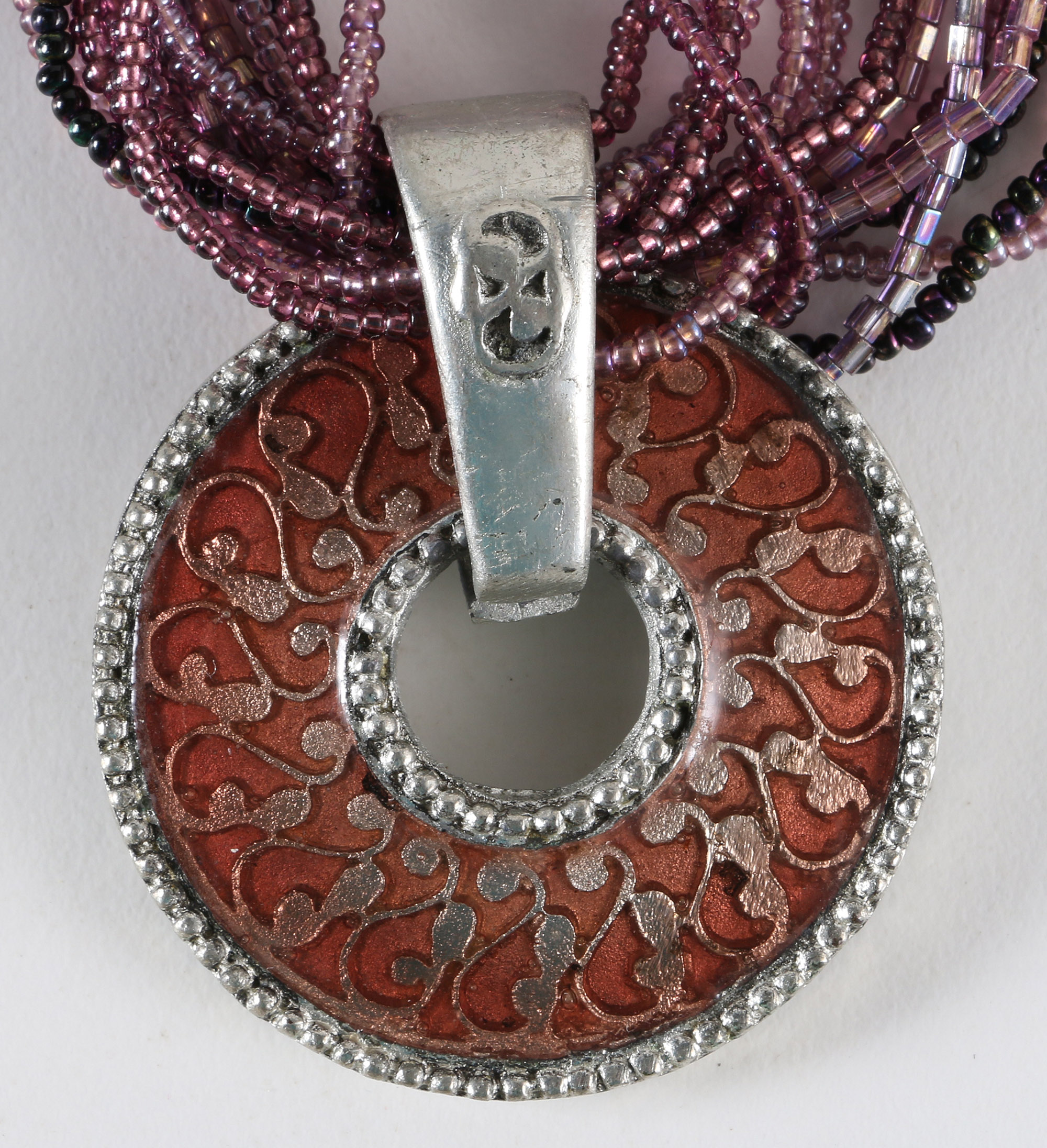 Costume Jewelry Including a Sterling Silver Pendant