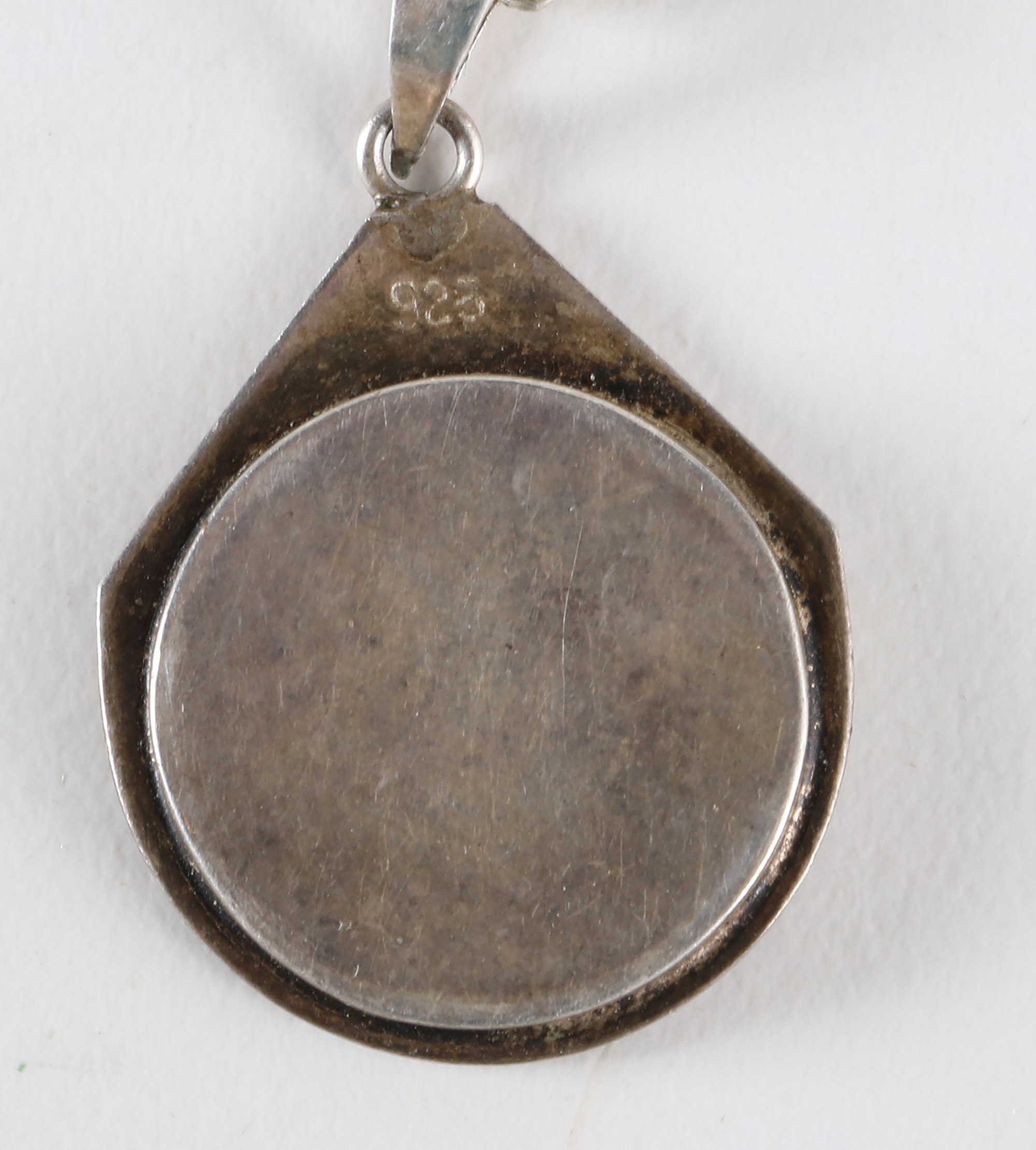 Costume Jewelry Including a Sterling Silver Pendant