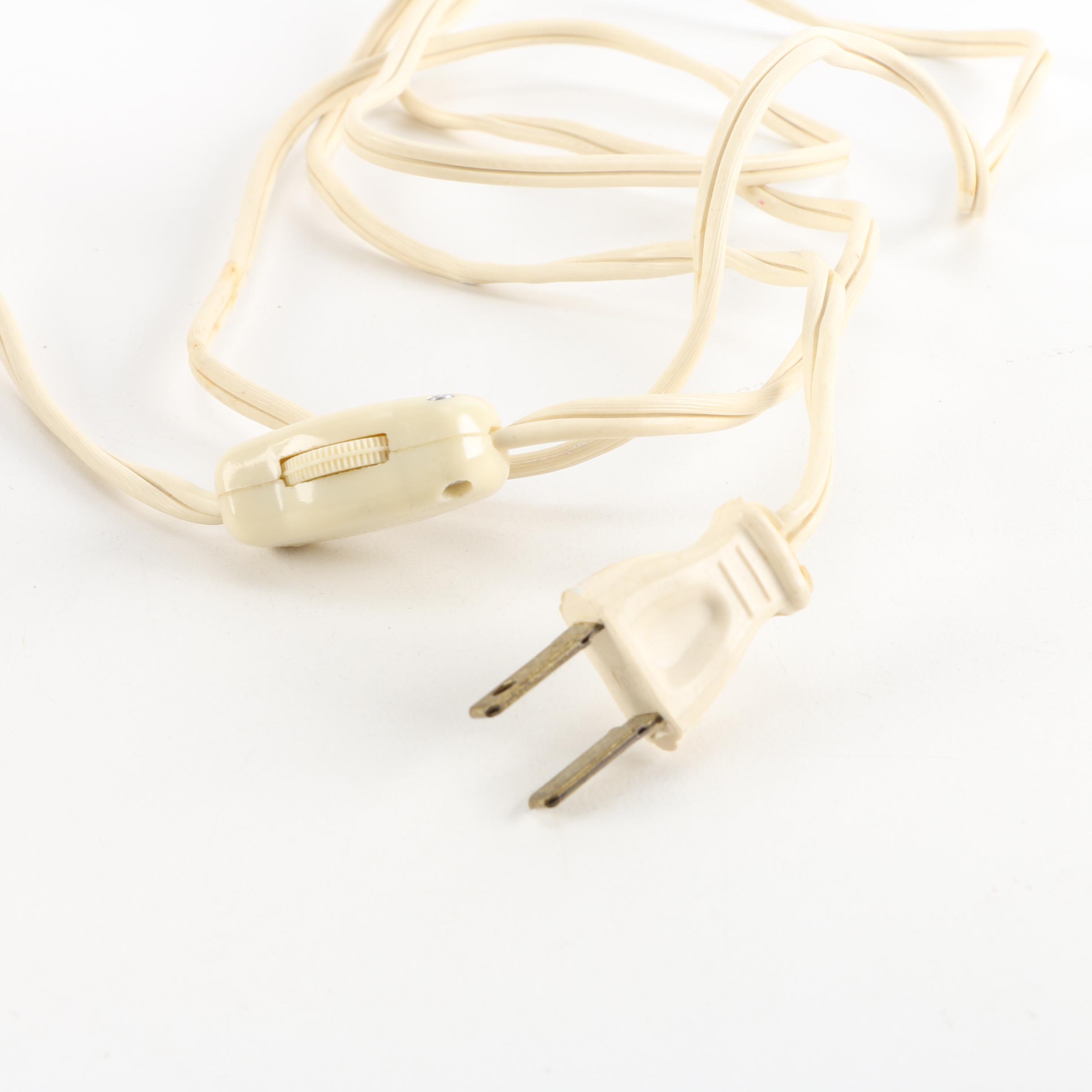 Figurine and Underwriters Laboratories Lamp