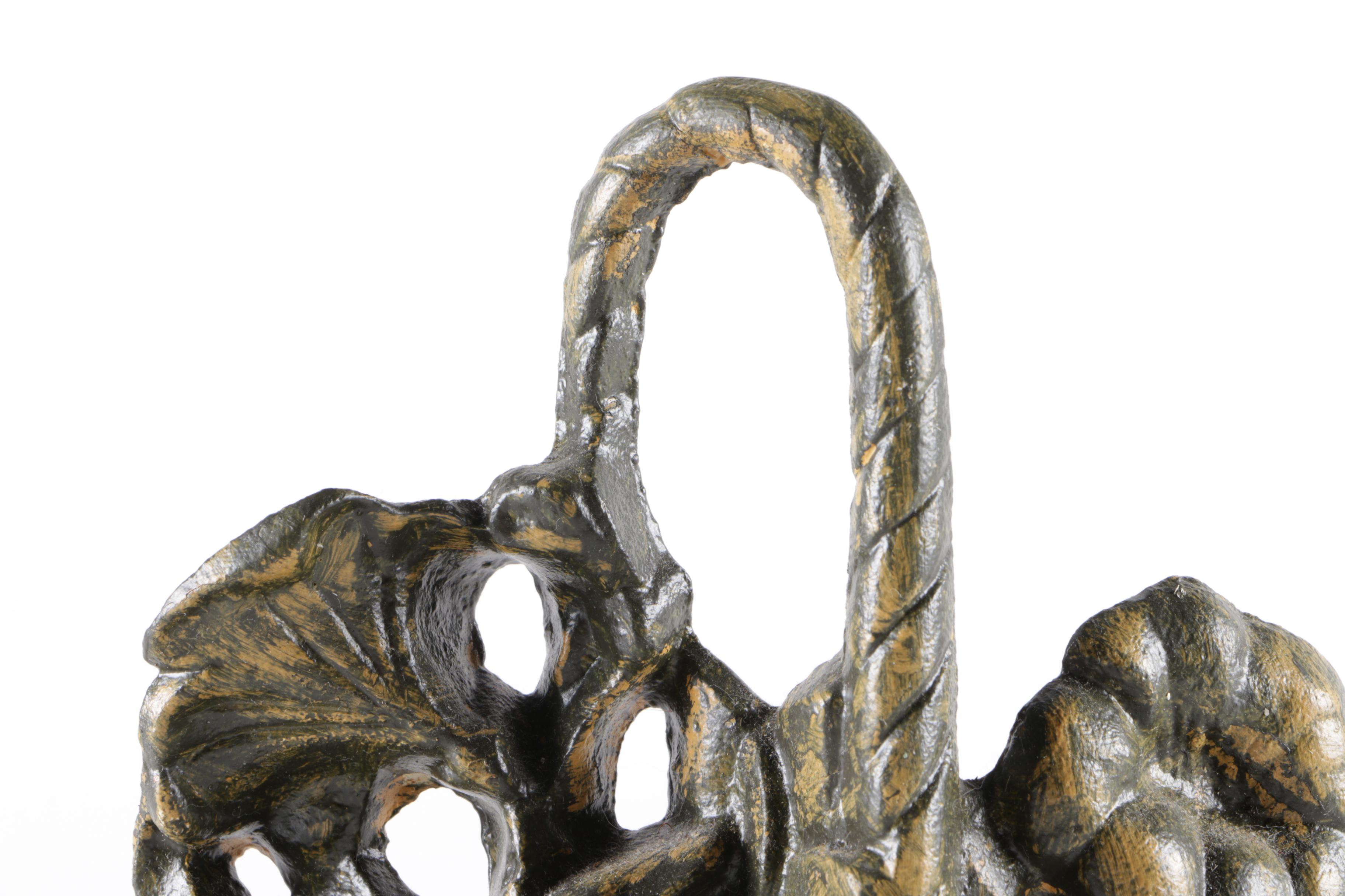 Cast Iron Floral Door Stopper with a Brass Patina